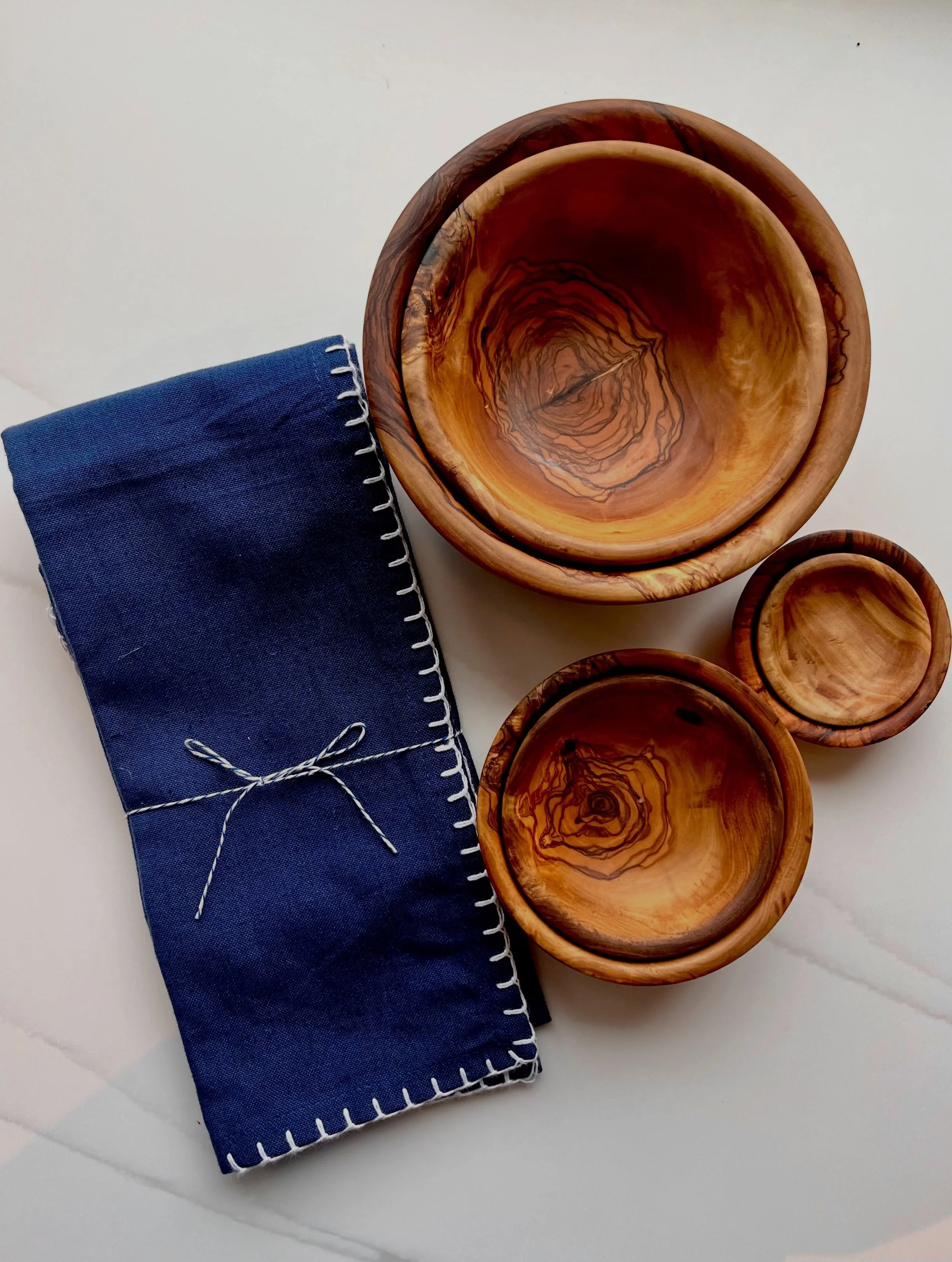 A beautiful table starts with the right pieces. 

New olive wood products, pitchers, and glasses in the shop now.

#olivewood #tablesettings #olivewoodproducts #homedecorating #kitechendecor