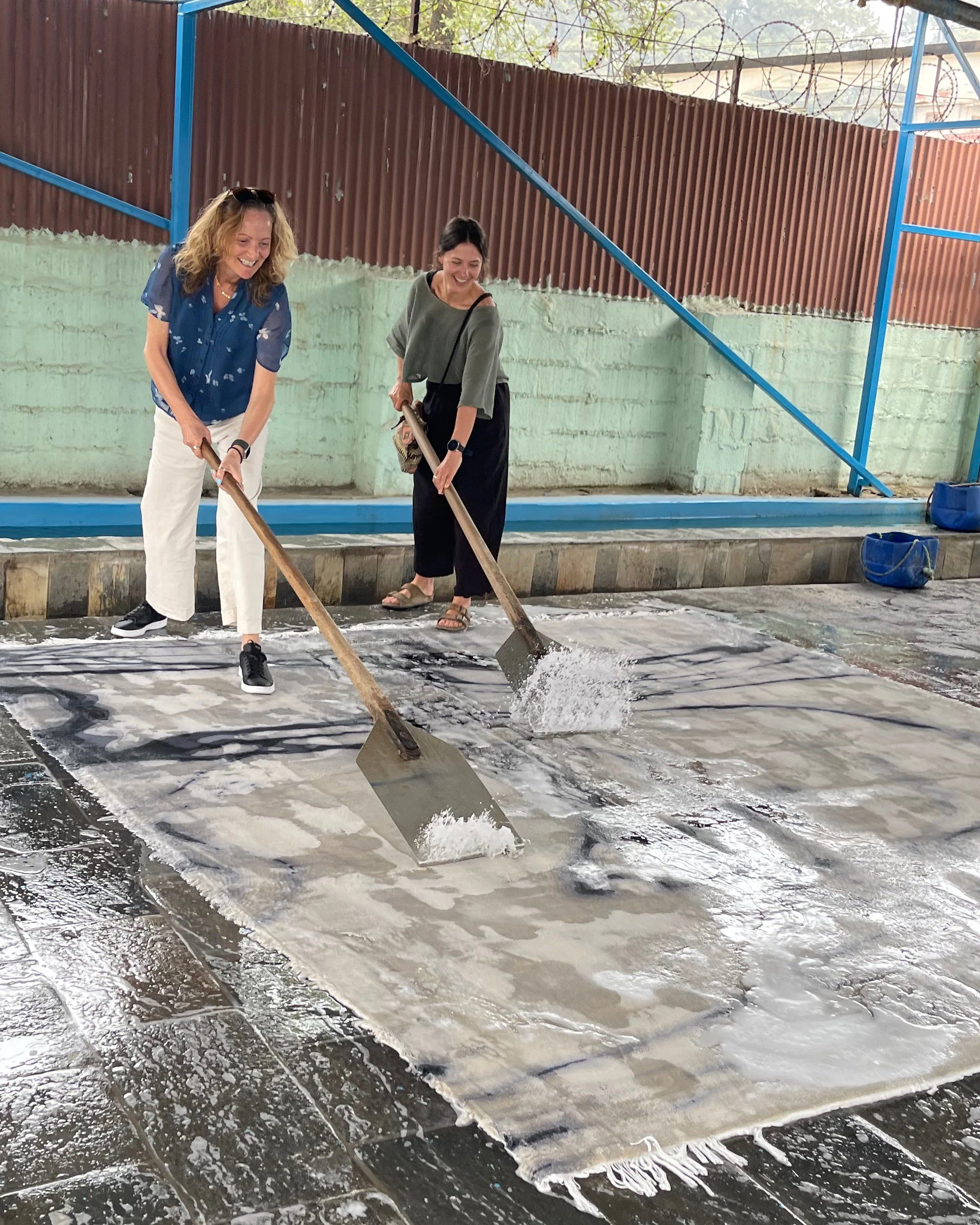 Production Tania and Chantelle hand washing rug.jpg