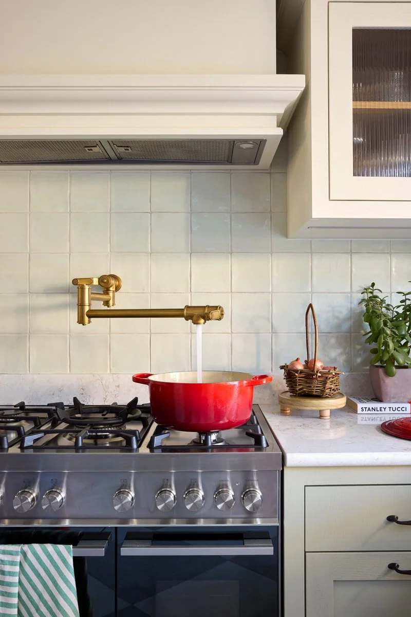 Pot filler tap detail in a bespoke soft kitchen designed for a London family home