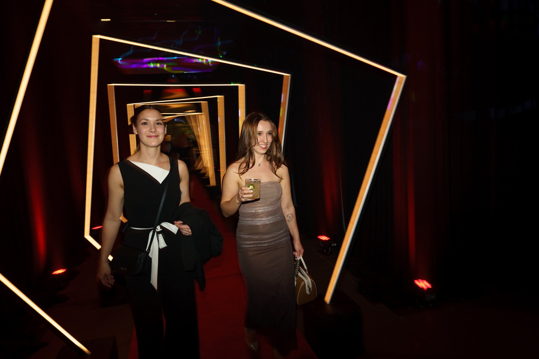 Team members networking during annual corporate gala in Montreal, photographed by SquareLoop.