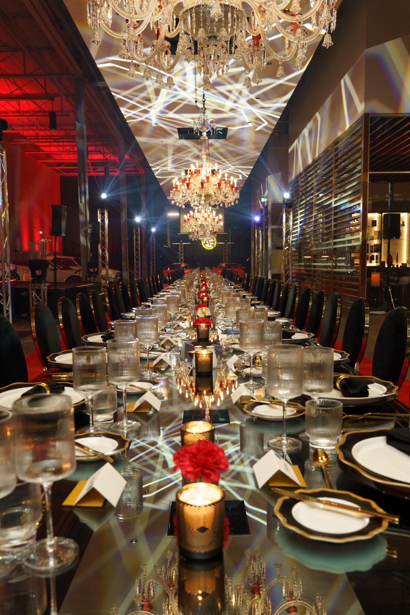 Team members networking during annual corporate gala at Automobiles Etcetera in Montreal, photographed by SquareLoop.