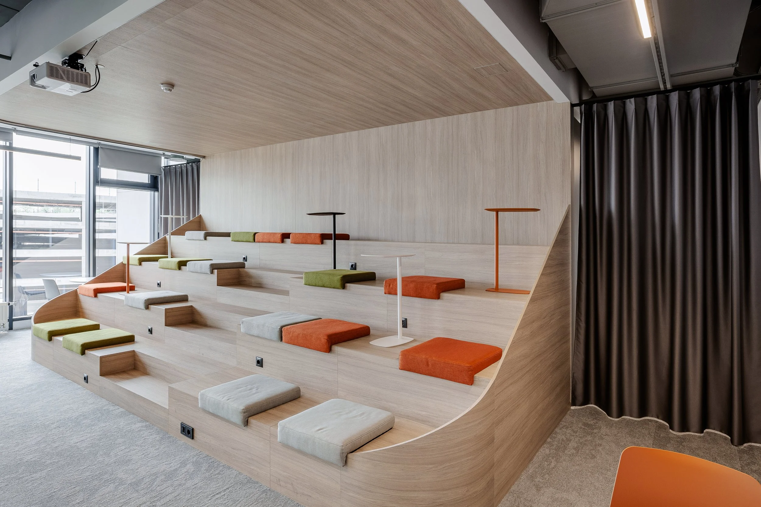amphitheater from wood LMDP steps with soft fabric pillows and innovative ceiling