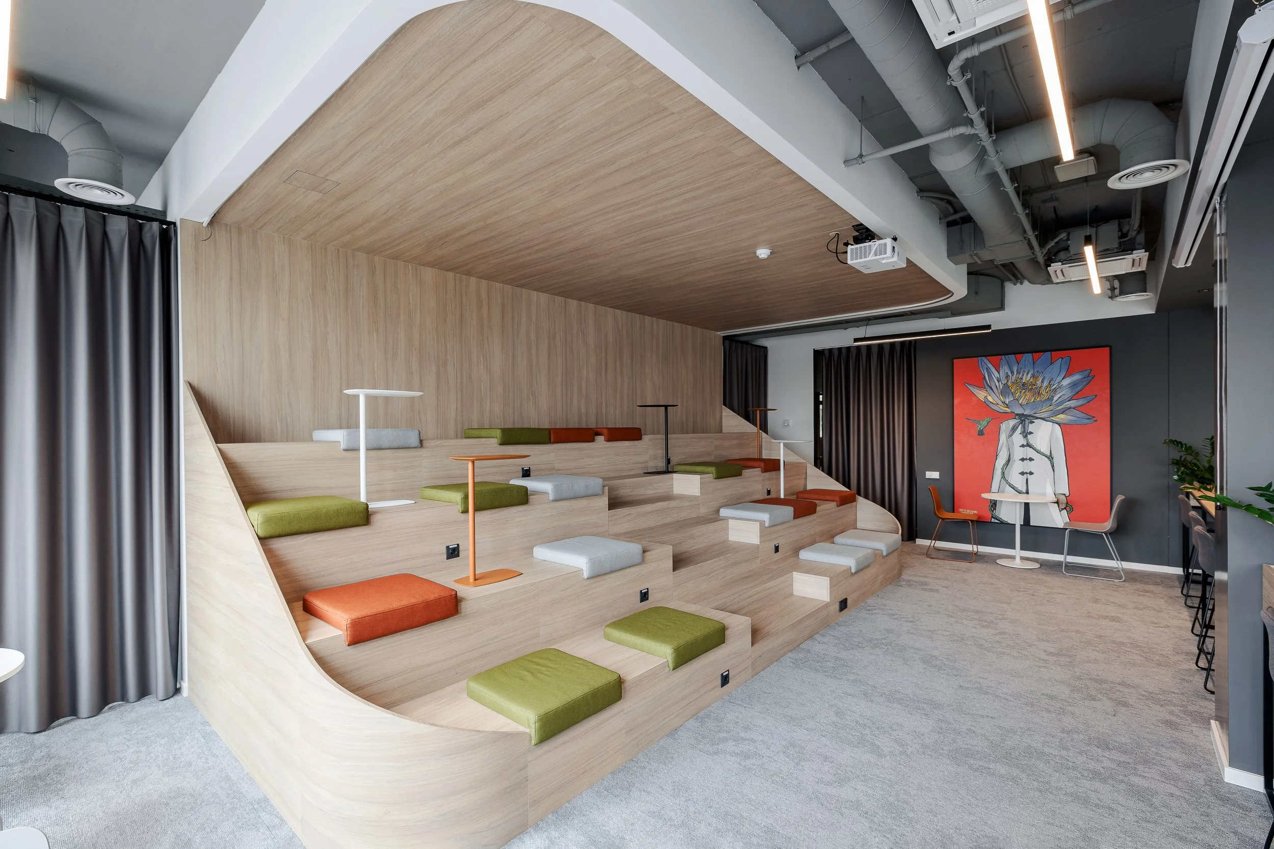 amfiteatre for office interior with soft fabric pillows