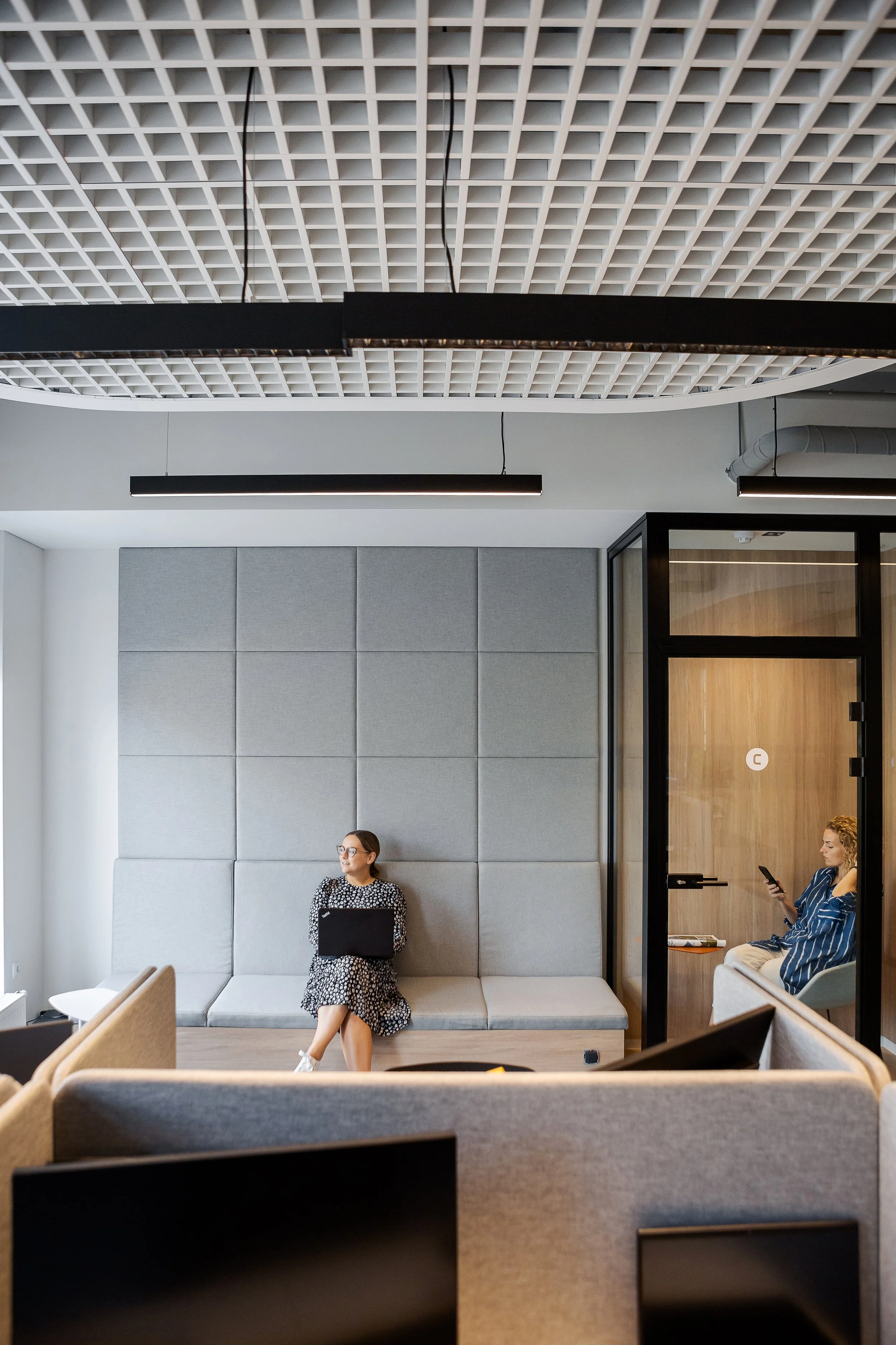 soft seating and chilling area with acoustic fabric wall