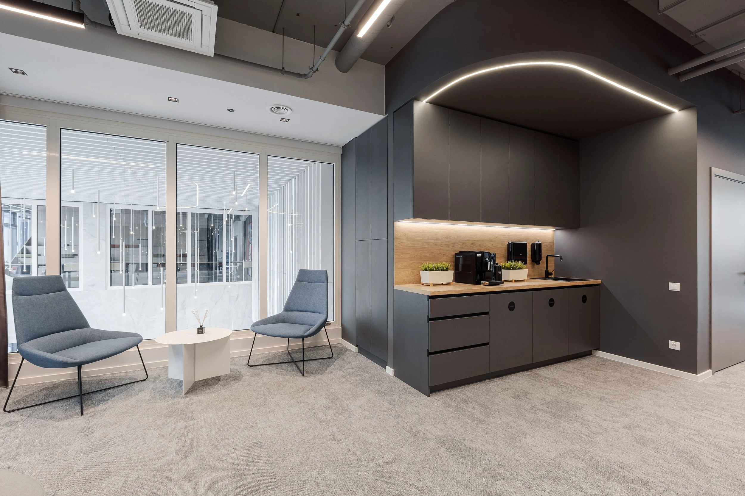 comfortable cafe spot for office with rounded cupboards  