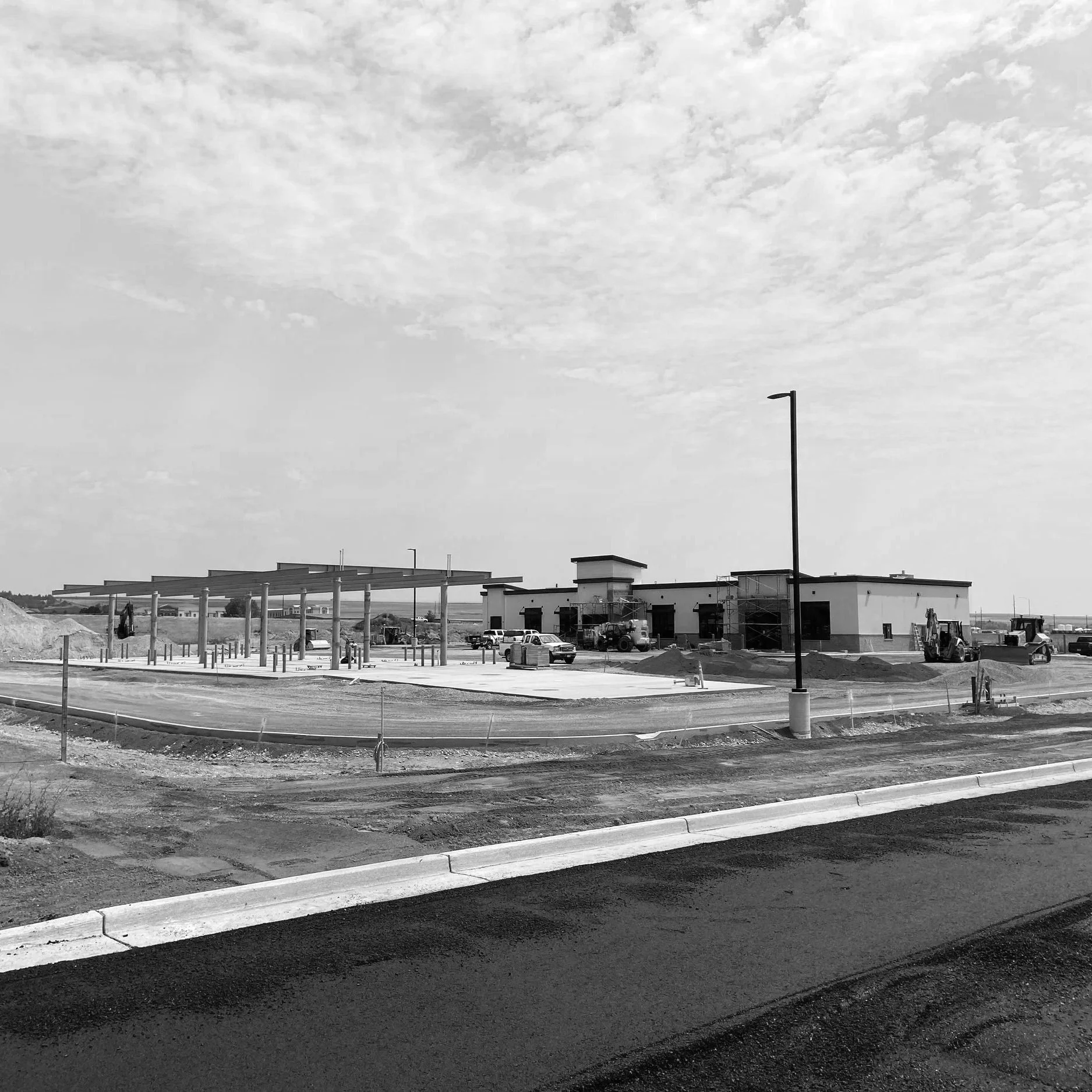 black and white photo of the construction of a gas station called Good 2 Go by civil engineering company Connect Engineering