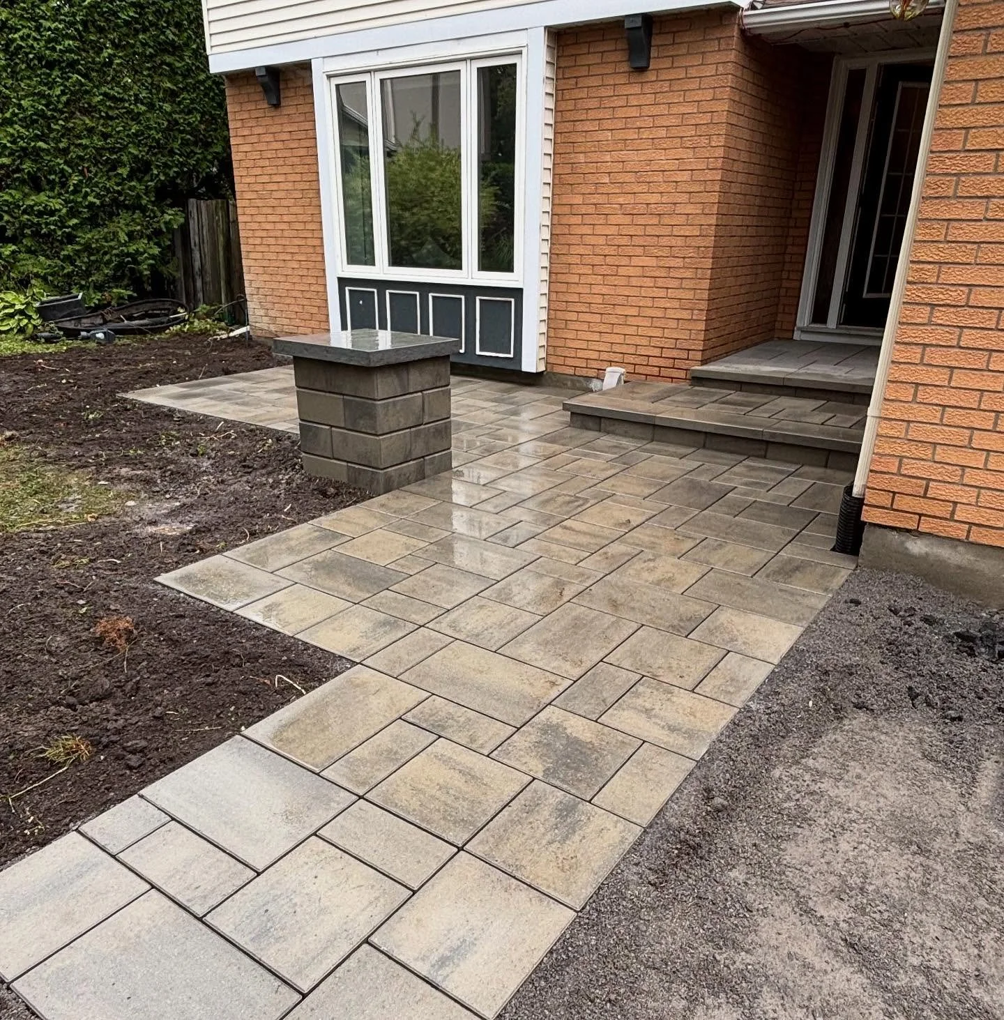 Beautiful interlock patio equipped with the matching light post 💡 🧱 #interlock #landscaping #ottawalandscaping