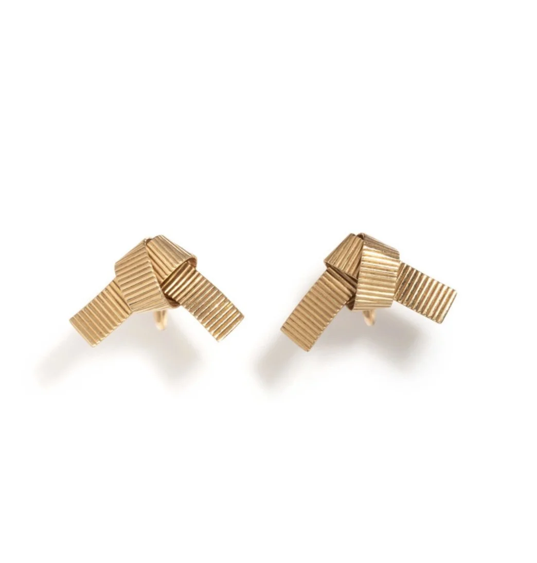Gold knot earrings, by Cartier