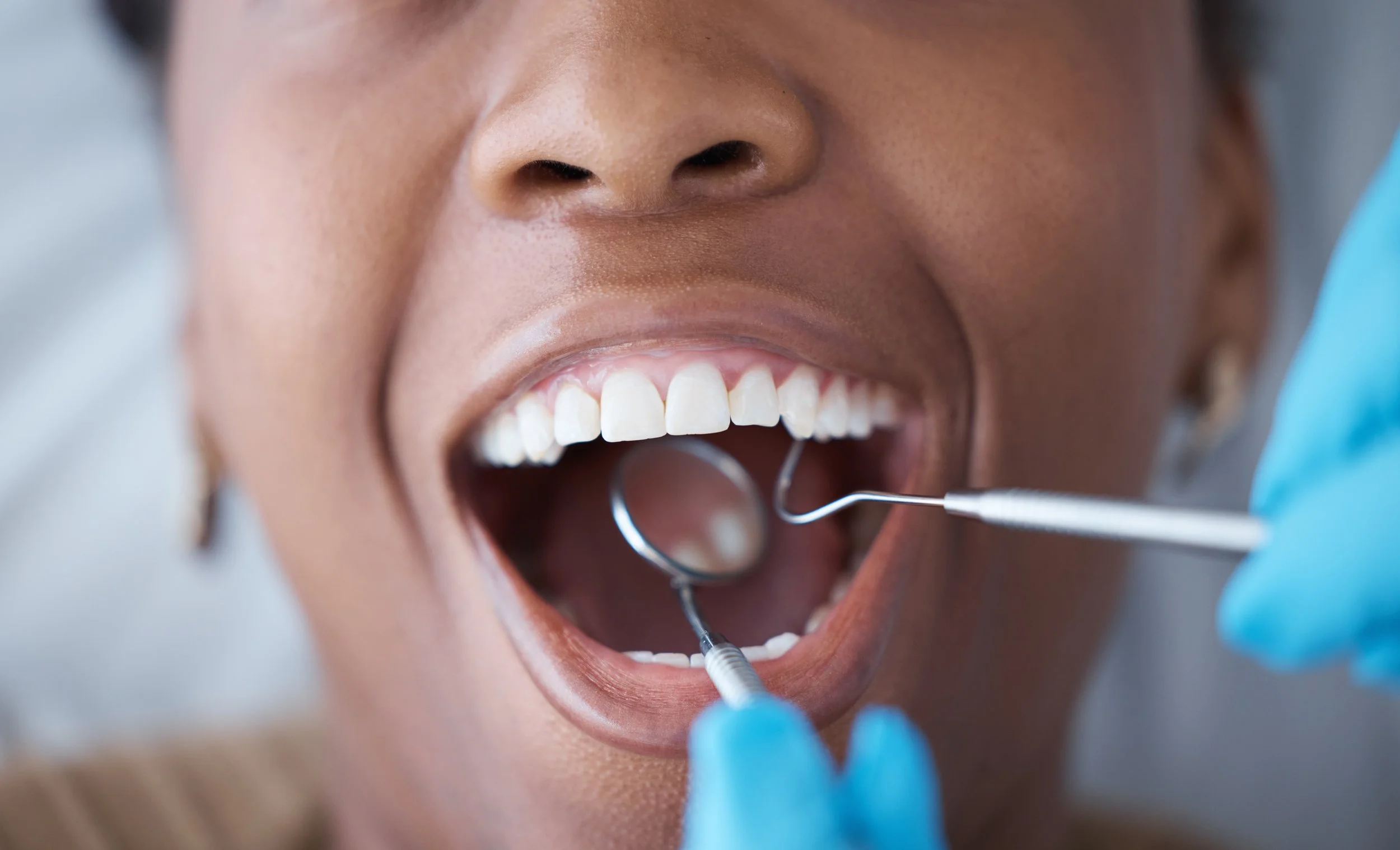 Child with dental instruments. Wondering how long a dental cleaning takes? Learn what happens at each type of appointment — routine, new patient, deep cleaning, and more — so you can schedule with confidence.