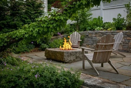 Elegant fire pit in Needham, MA backyard
