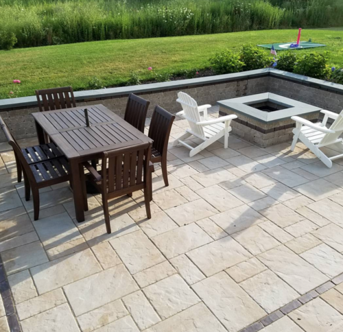 Sudbury, MA fire pit creating warm backyard atmosphere