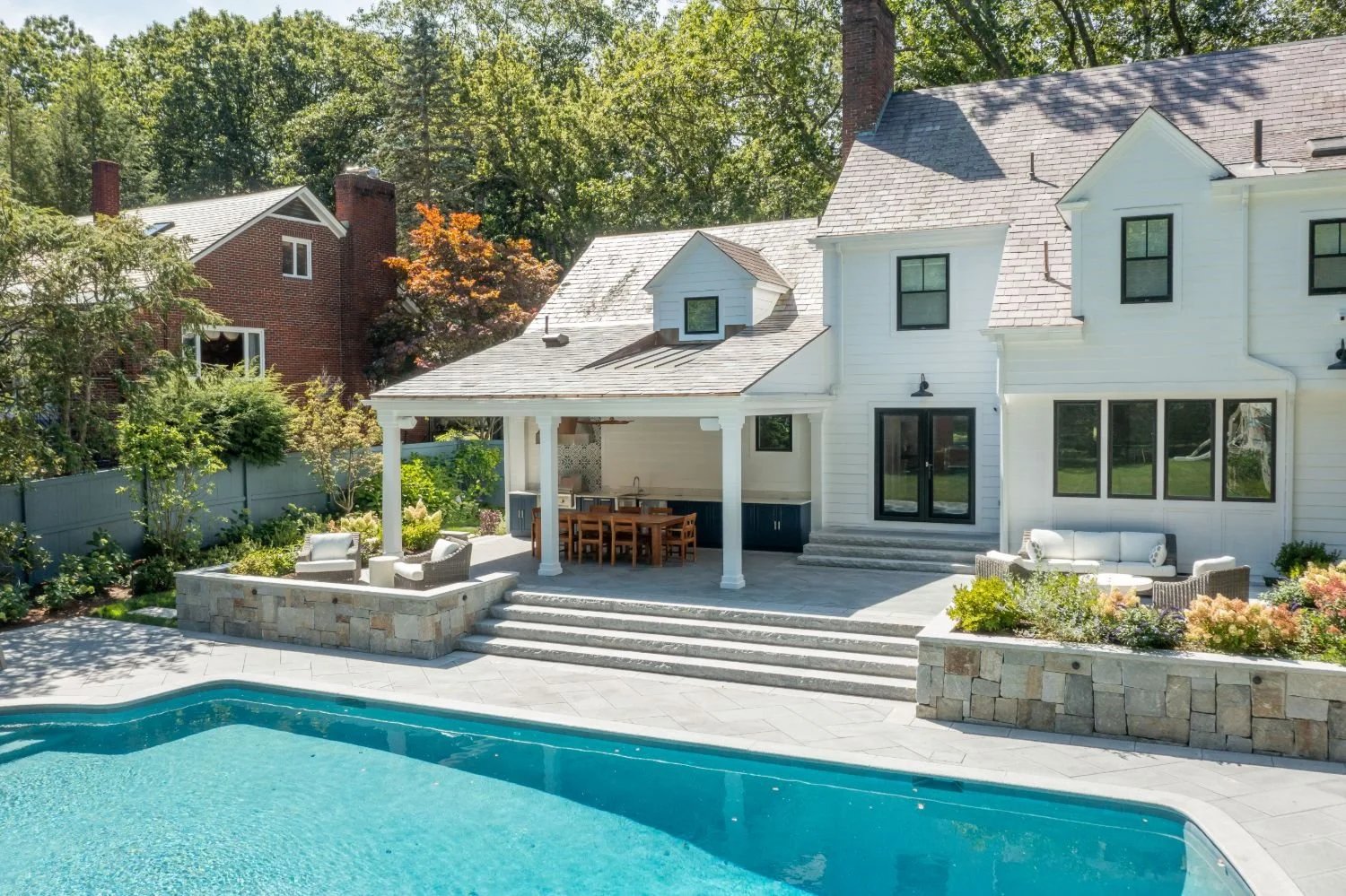 Pool deck and patio surfaces designed for durability and everyday use in Newton, MA