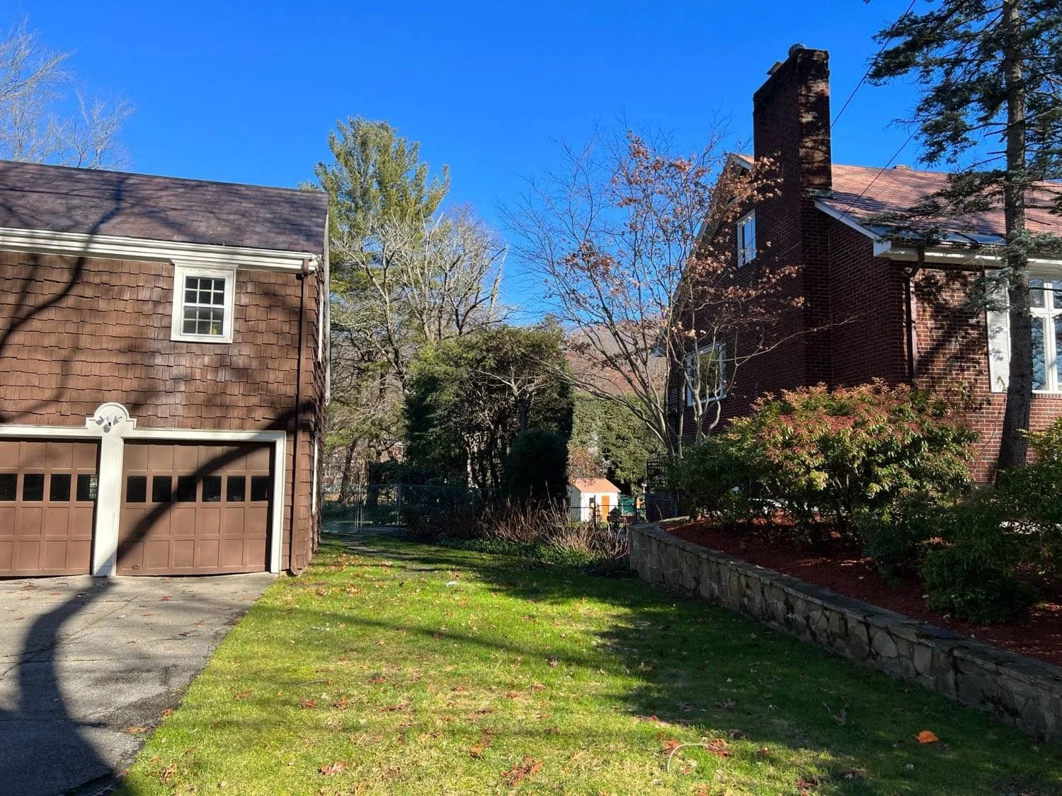 Driveway Pavers and Walkway Pavers Framing a Full Property Renovation in Belmont, MA