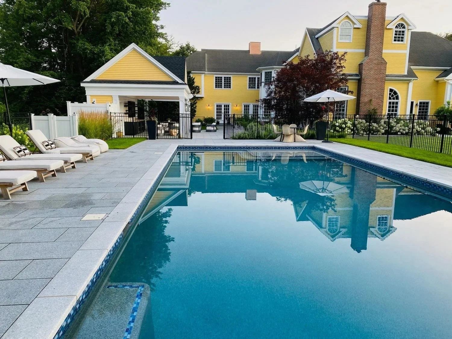 Permeable pavers and Unilock driveway concepts in Carlisle, MA.