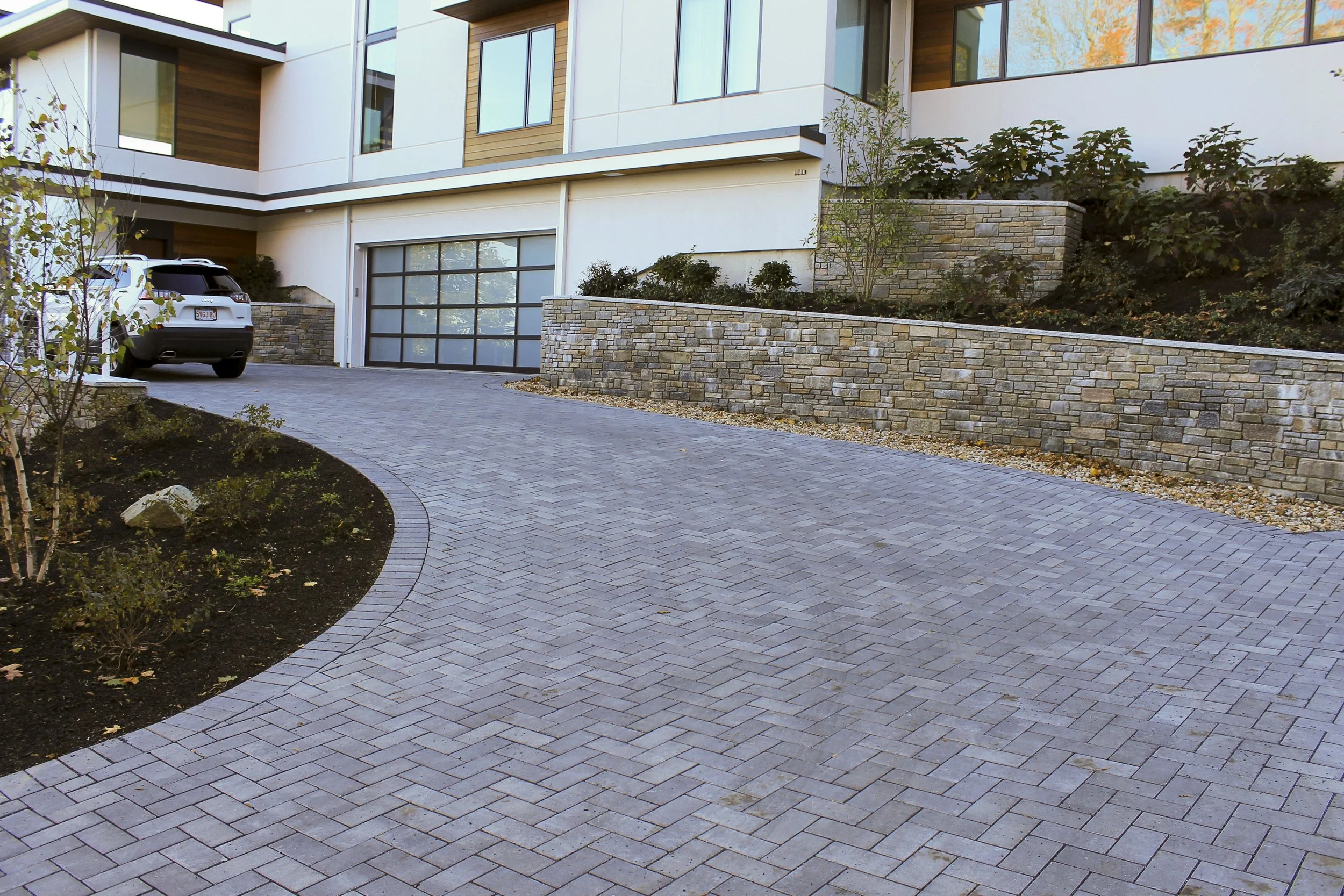 Elegant driveway pavers creating a grand entrance in Newton, MA