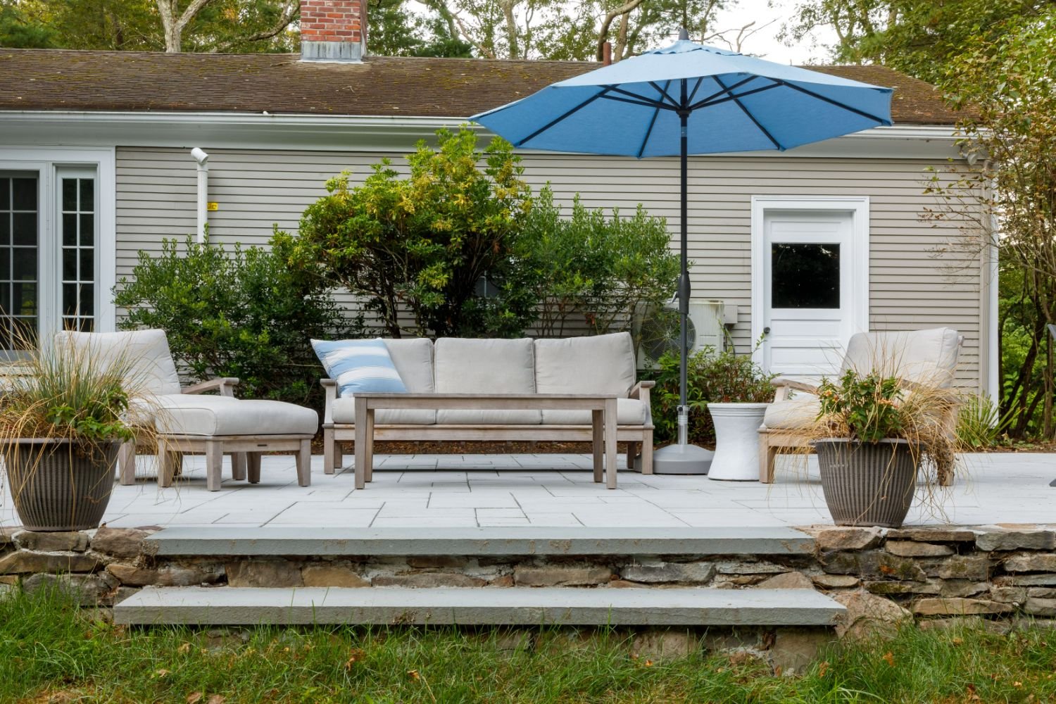 Expanded Patio Pavers With Integrated Outdoor Lighting and Fire Pit Lounge in Belmont, MA