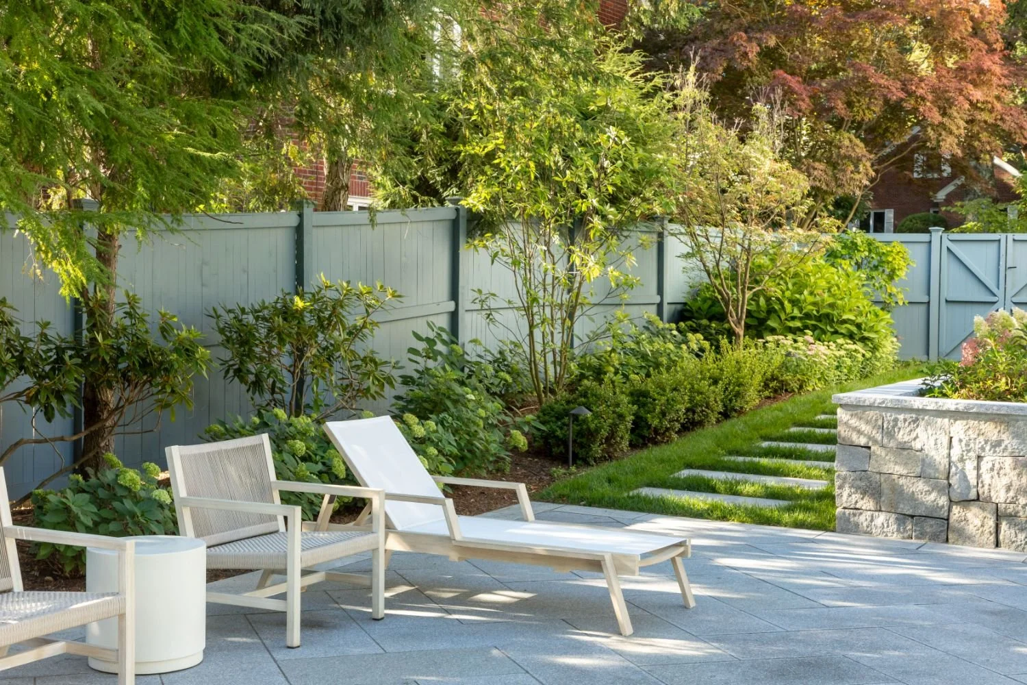 Pool and patio layout designed for family gatherings and entertaining in Newton, MA