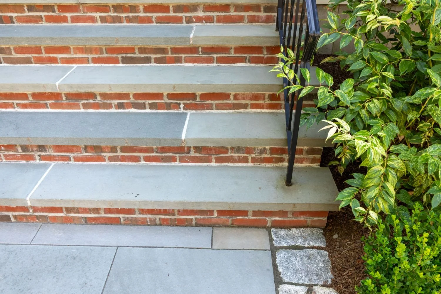 Front entry brick and stone steps with patio pavers in Arlington, MA