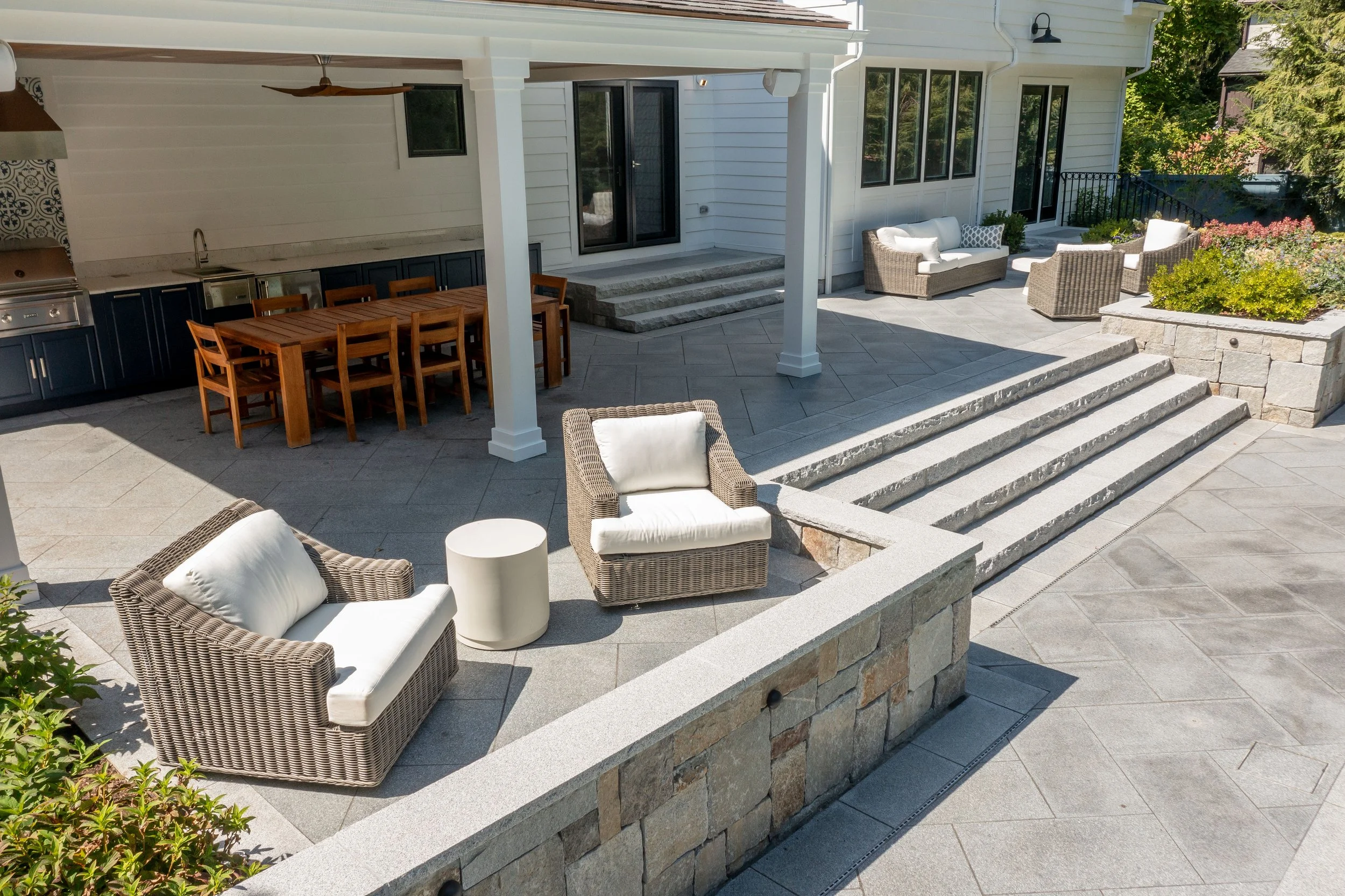 How a Hardscape Company and Retaining Wall in Jamaica Plain, MA, Improves Usable Backyard Space