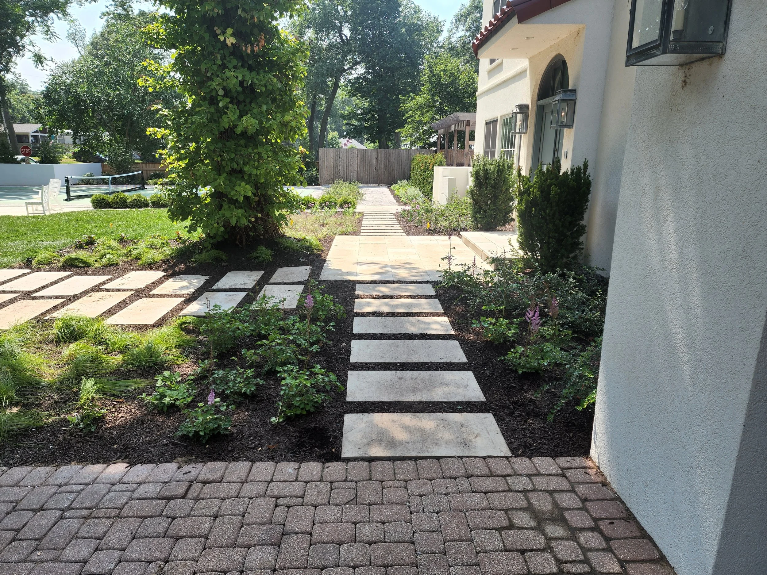 New Buffalo hardscape and softscape integration in a luxury backyard