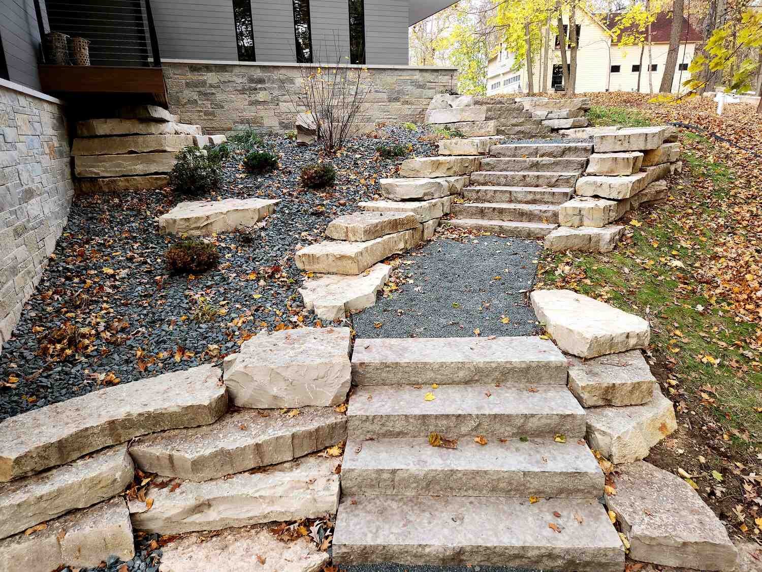 Layered stone pathways connecting outdoor levels in Waunakee, WI