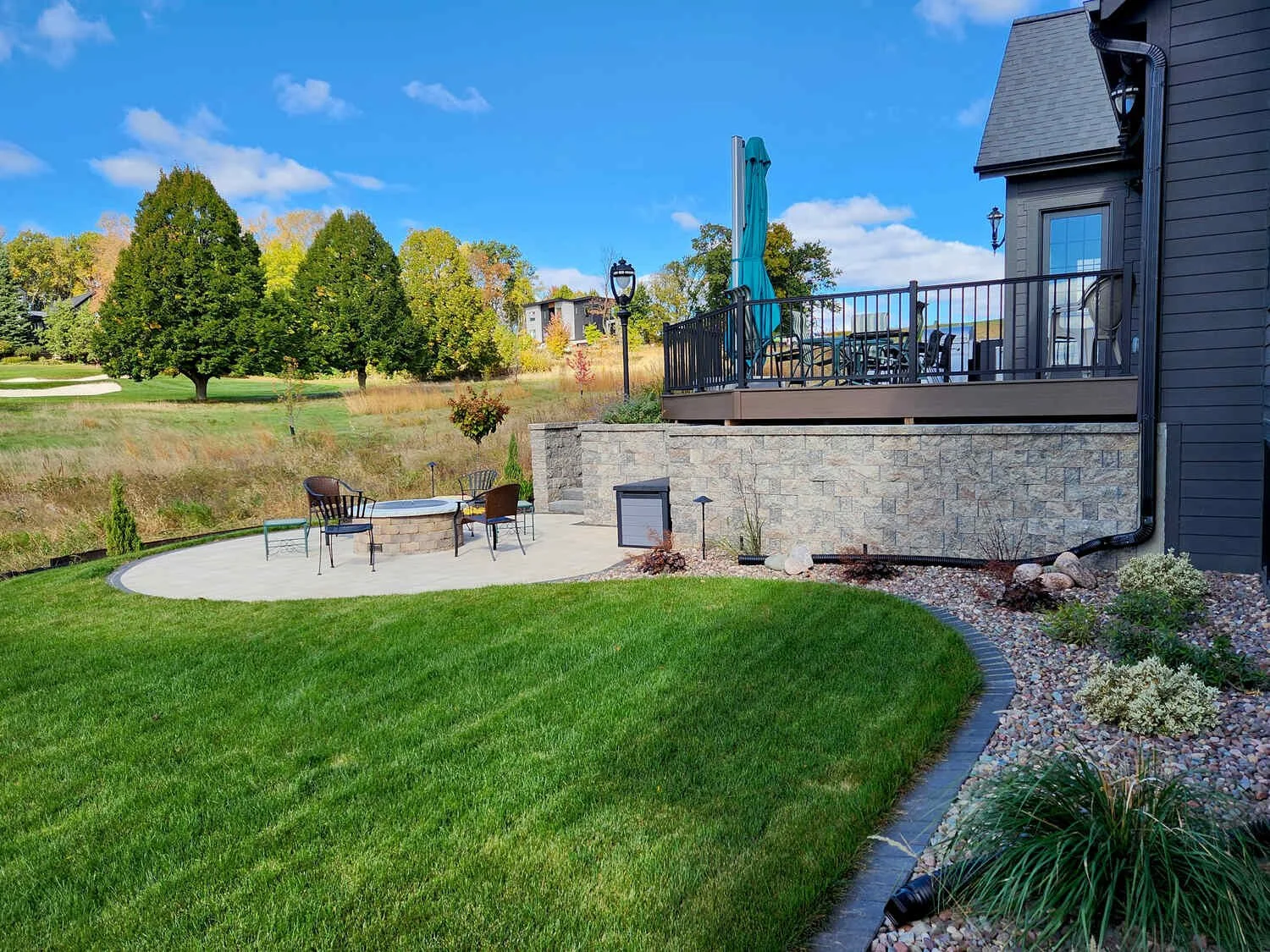 Golf course-facing backyard with strategic grading in Waunakee, WI