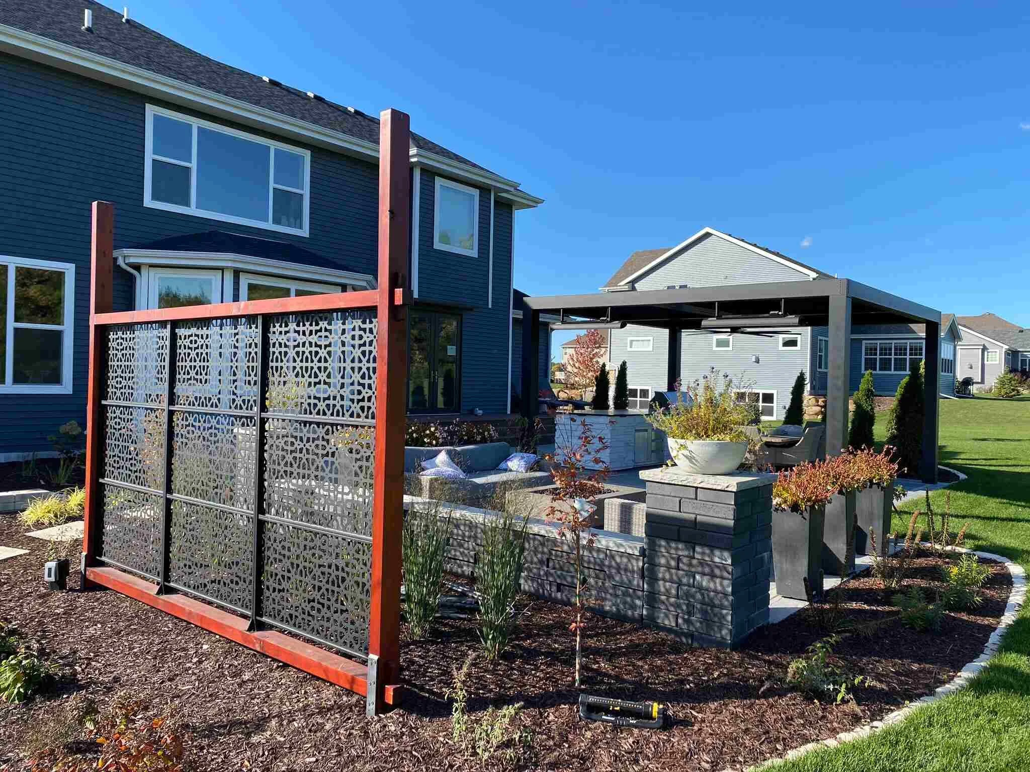 Integrated patio and walkway connecting outdoor zones in Madison, WI