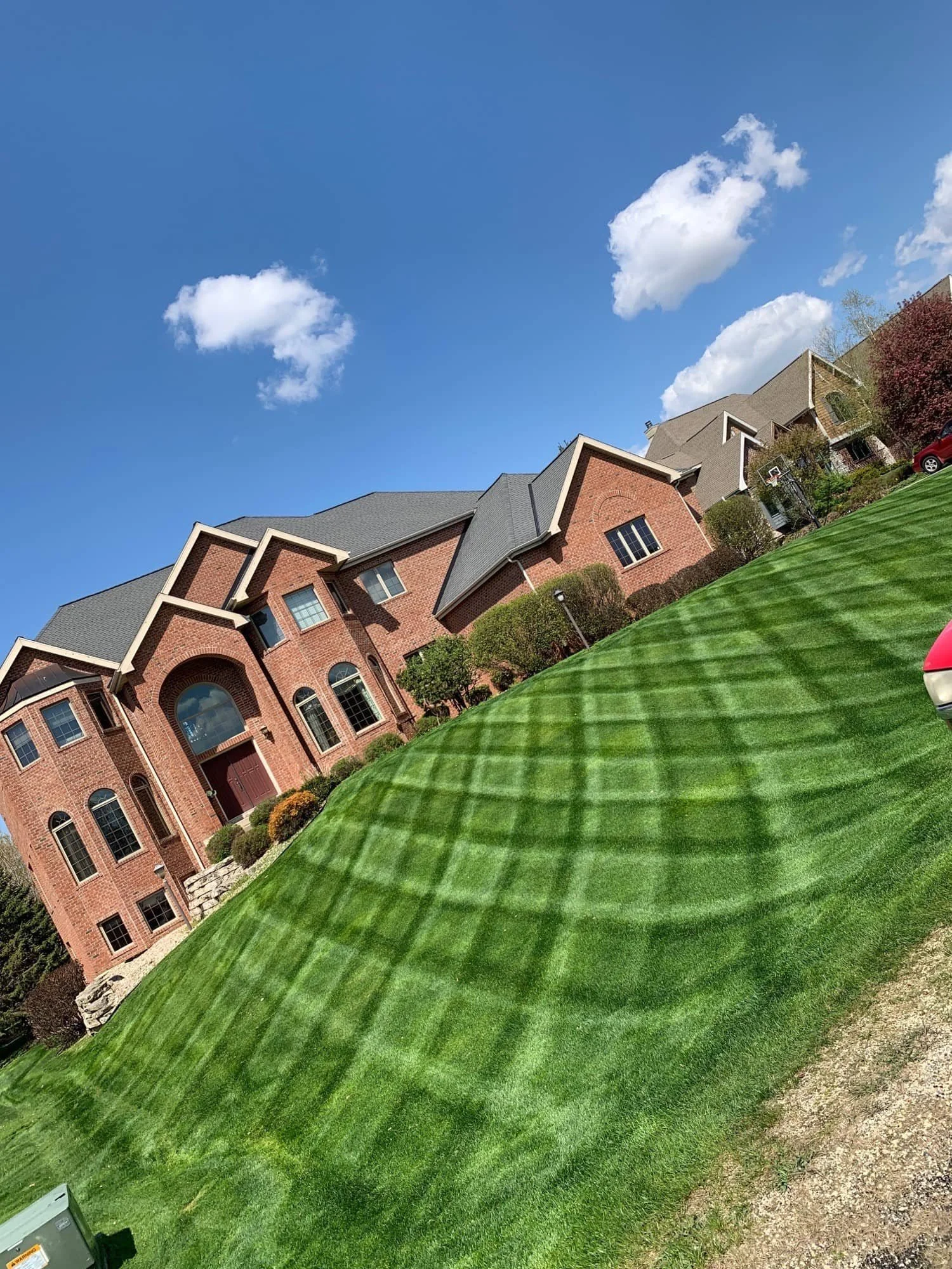 Weekly mowing on multi-unit residential lawn in Waunakee, WI