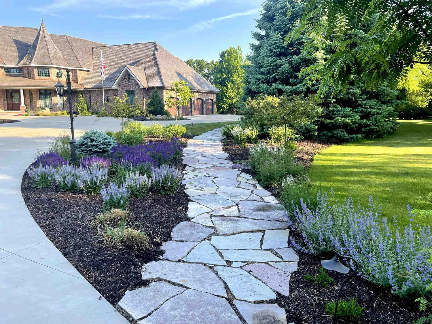 Custom beds with eco-friendly plantings to attract butterflies in Madison, WI