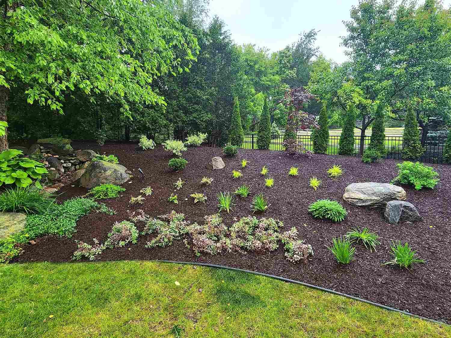 Curb appeal upgrade with colorful flower beds in Waunakee, WI