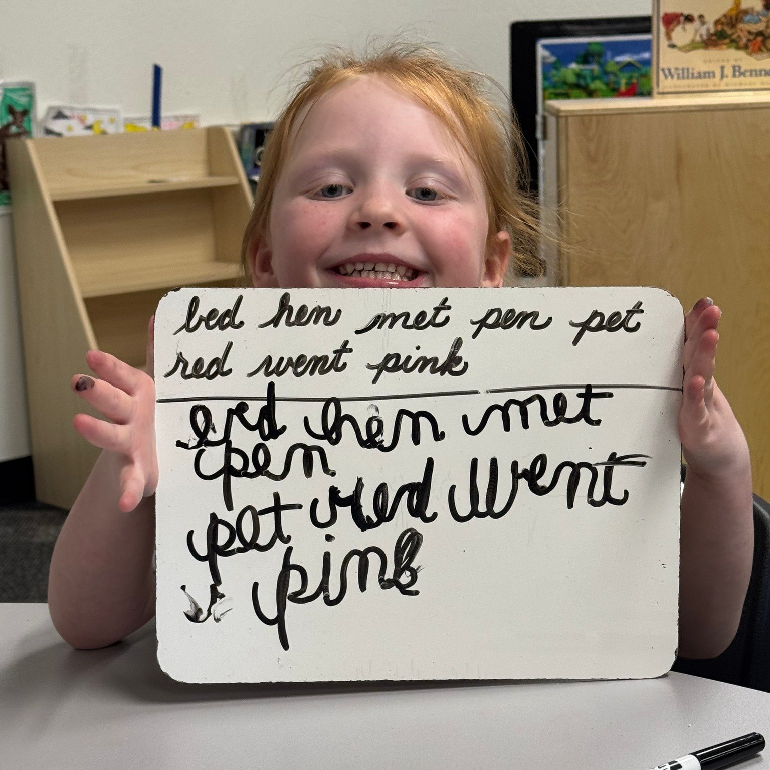 She is not even 5. And she writes in cursive.

Our Kindergarteners learn cursive from day one, and watching them take off with it never gets old. This girl filled that whole whiteboard and could not be more proud of herself. Honestly, neither can we.