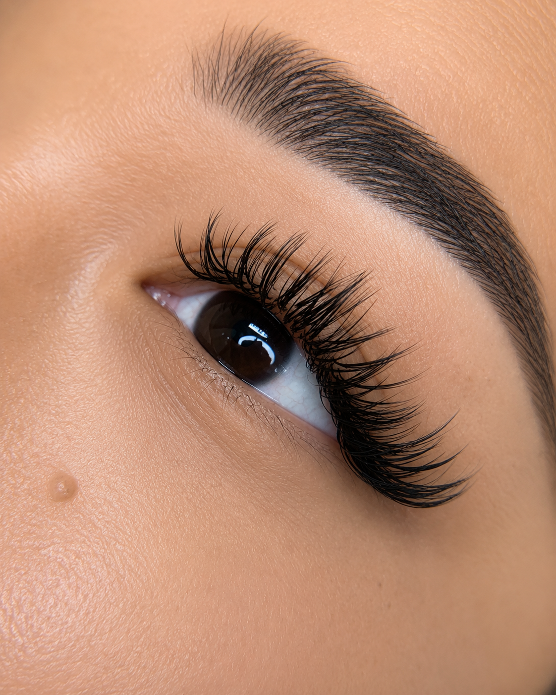 Wet lash extensions with defined textured lashes at Thao SD Brow & Lash in San Diego
