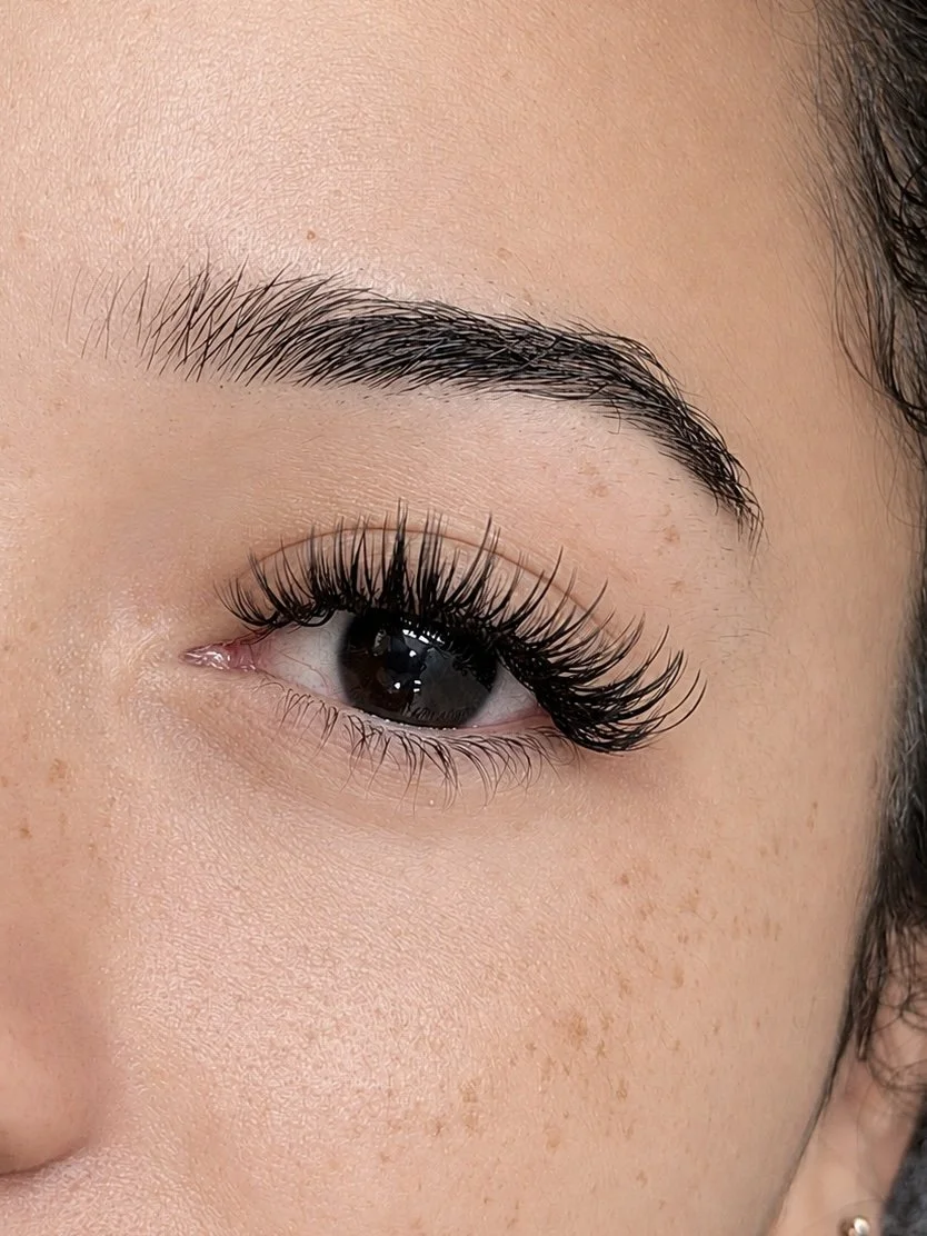 Hybrid wispy lash extensions with textured spikes at Thao SD Brow & Lash in San Diego