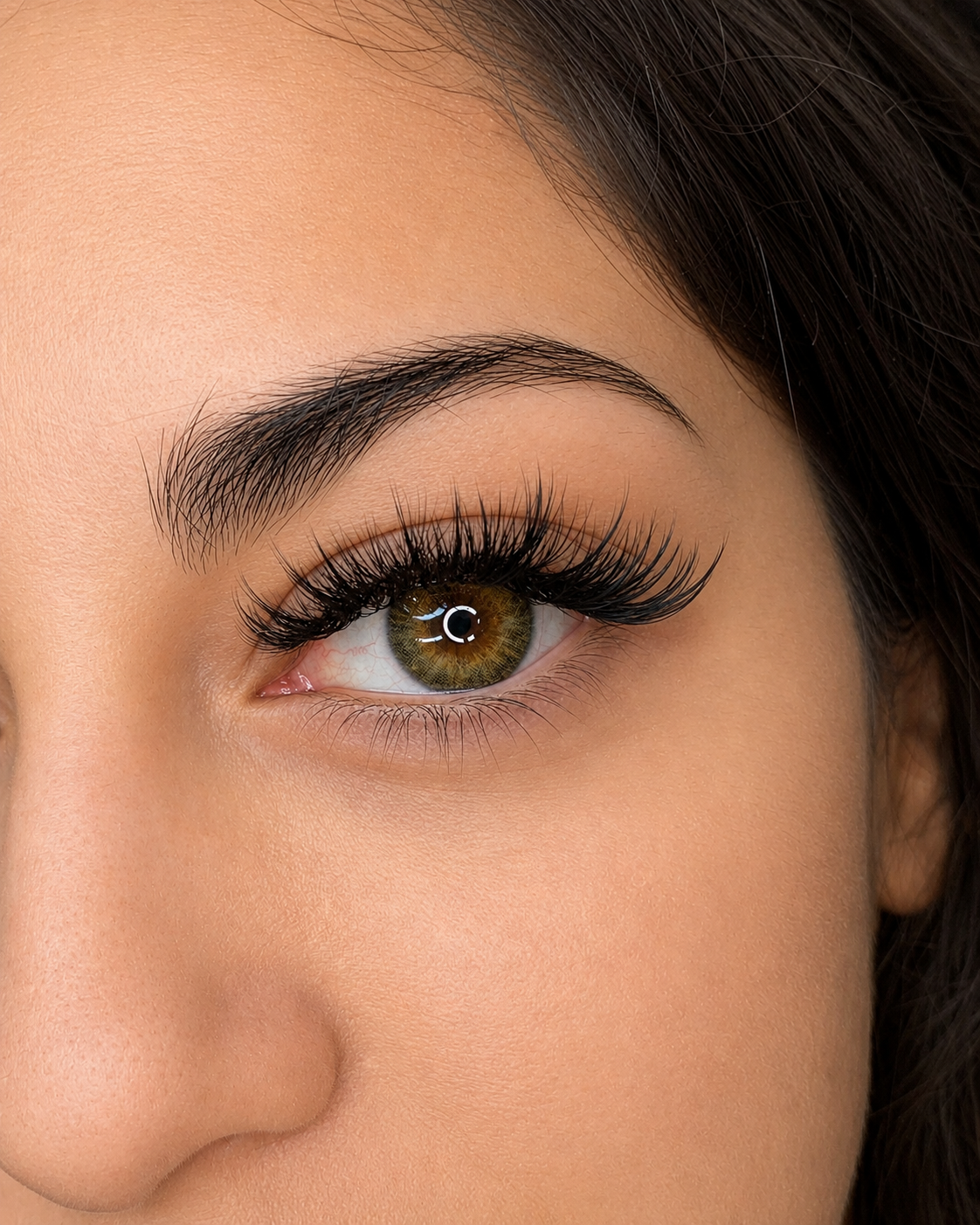 Wispy hybrid lash extensions with soft textured spikes at Thao SD Brow & Lash in San Diego