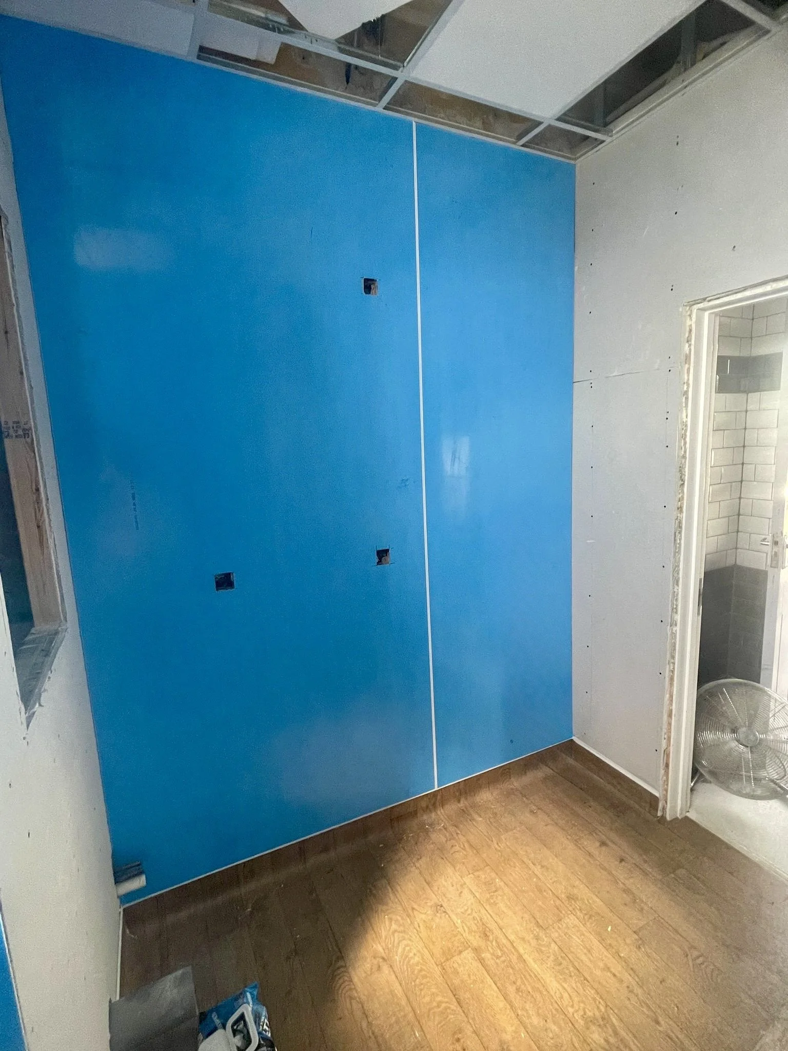 Installation of hard wearing hygienic wall cladding, at Whitstable Railway Station in Kent, installed by Cladify.