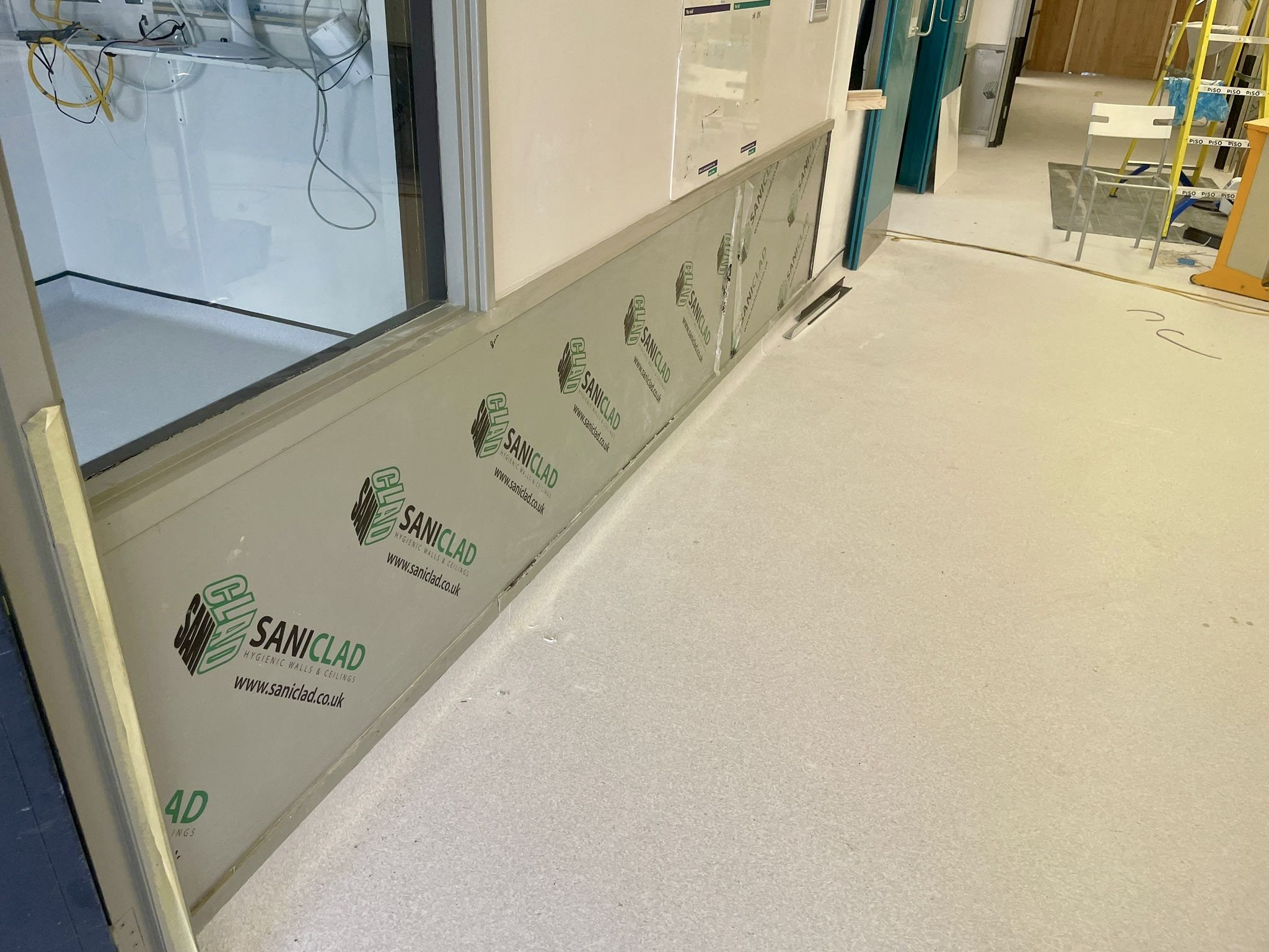 An empty hospital under construction, with saniclad hygienic wall cladding installed.