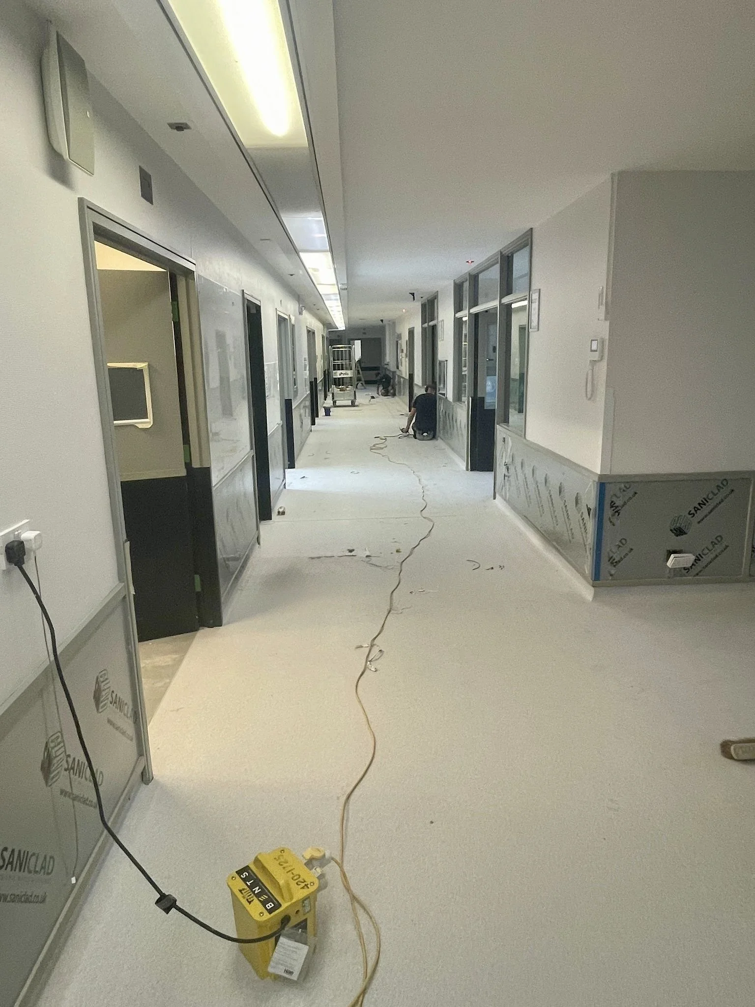 An empty hospital under construction, with saniclad hygienic wall cladding installed.