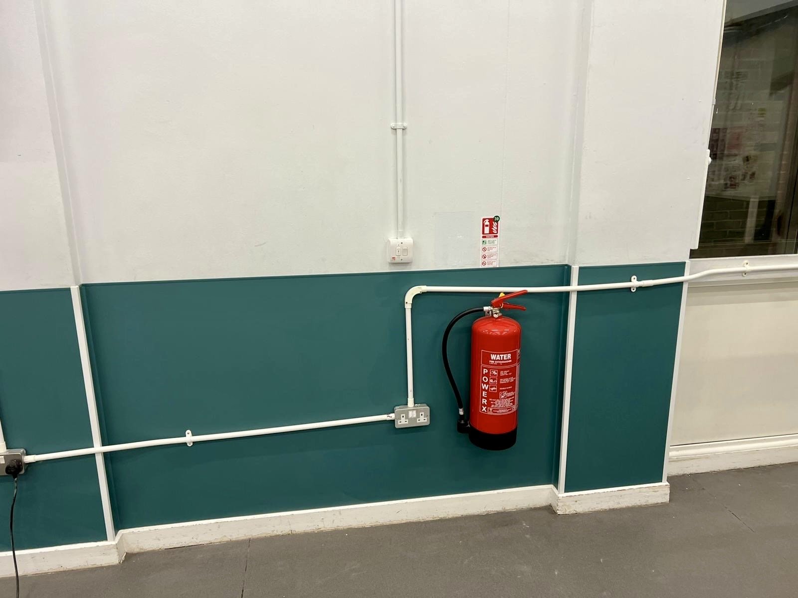 Installation of hard wearing hygienic wall cladding, at Iwade School in Sittingbourne Kent, installed by Cladify.