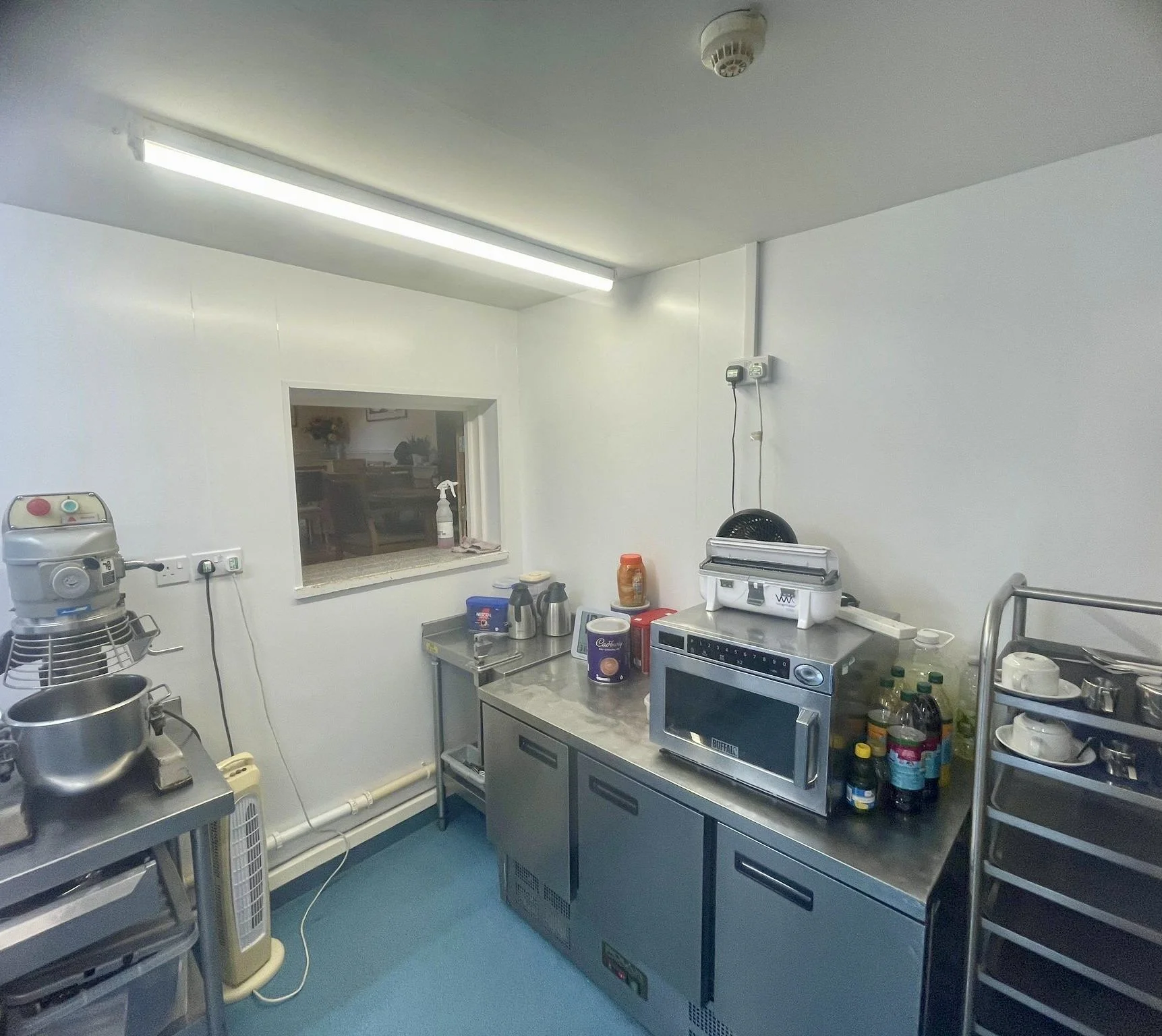 Installation of hard wearing hygienic wall cladding, at Lavenders Care Home in Kent, installed by Cladify.