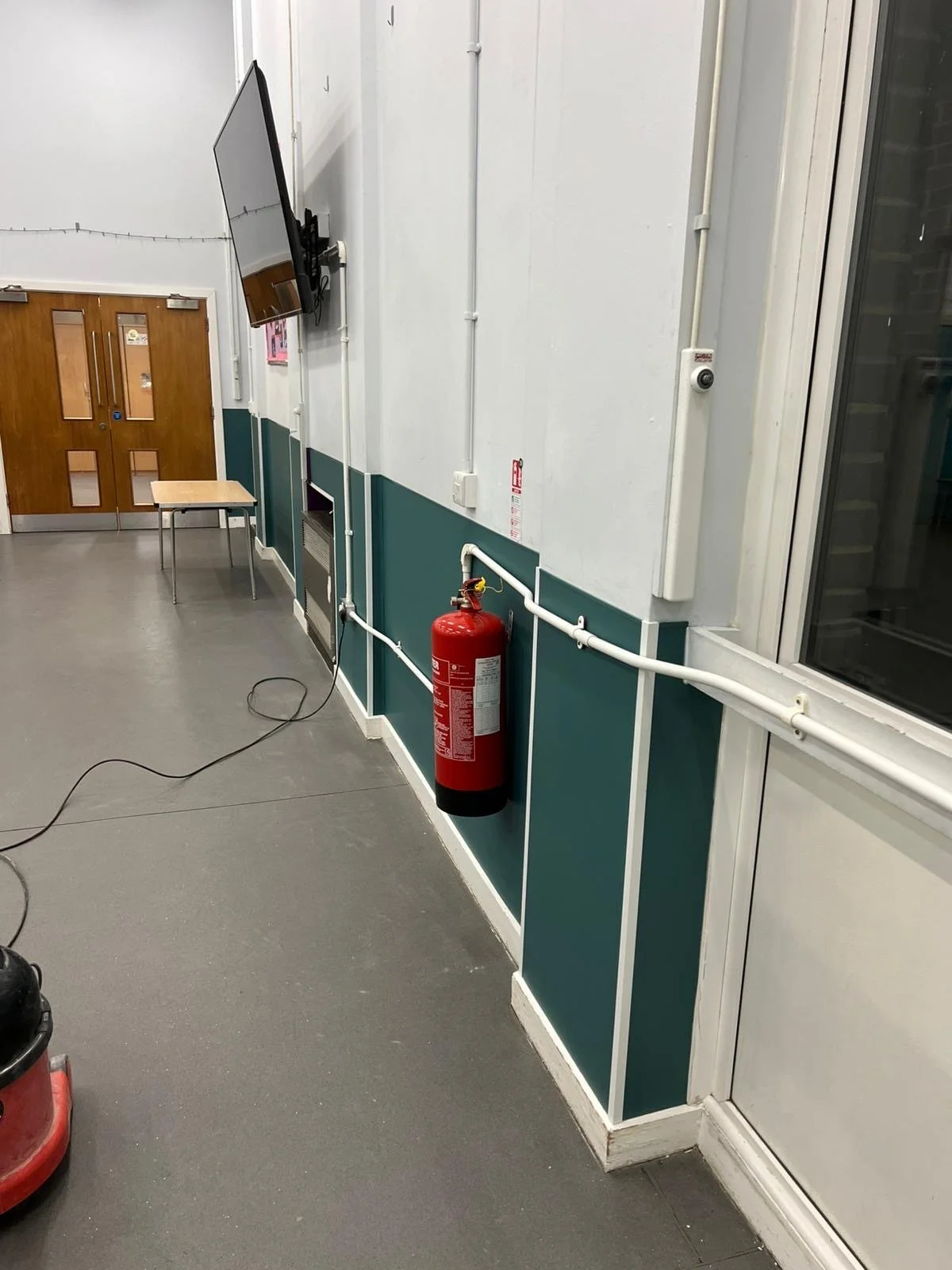 Installation of hard wearing hygienic wall cladding, at Iwade School in Sittingbourne Kent, installed by Cladify.