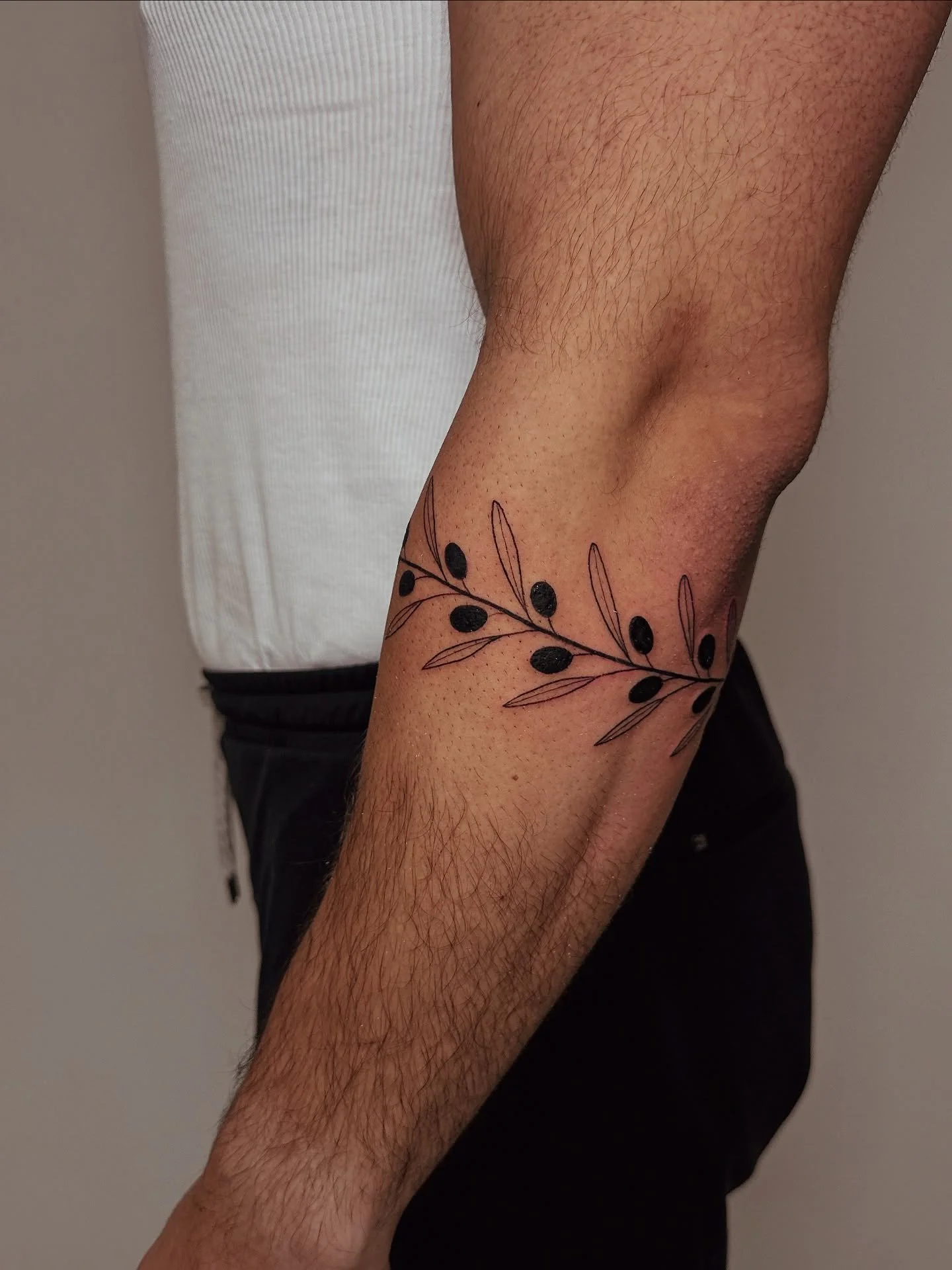 wrap around made of an olive branch.
🍉🙏🏽 Resist, revolt, decolonize.