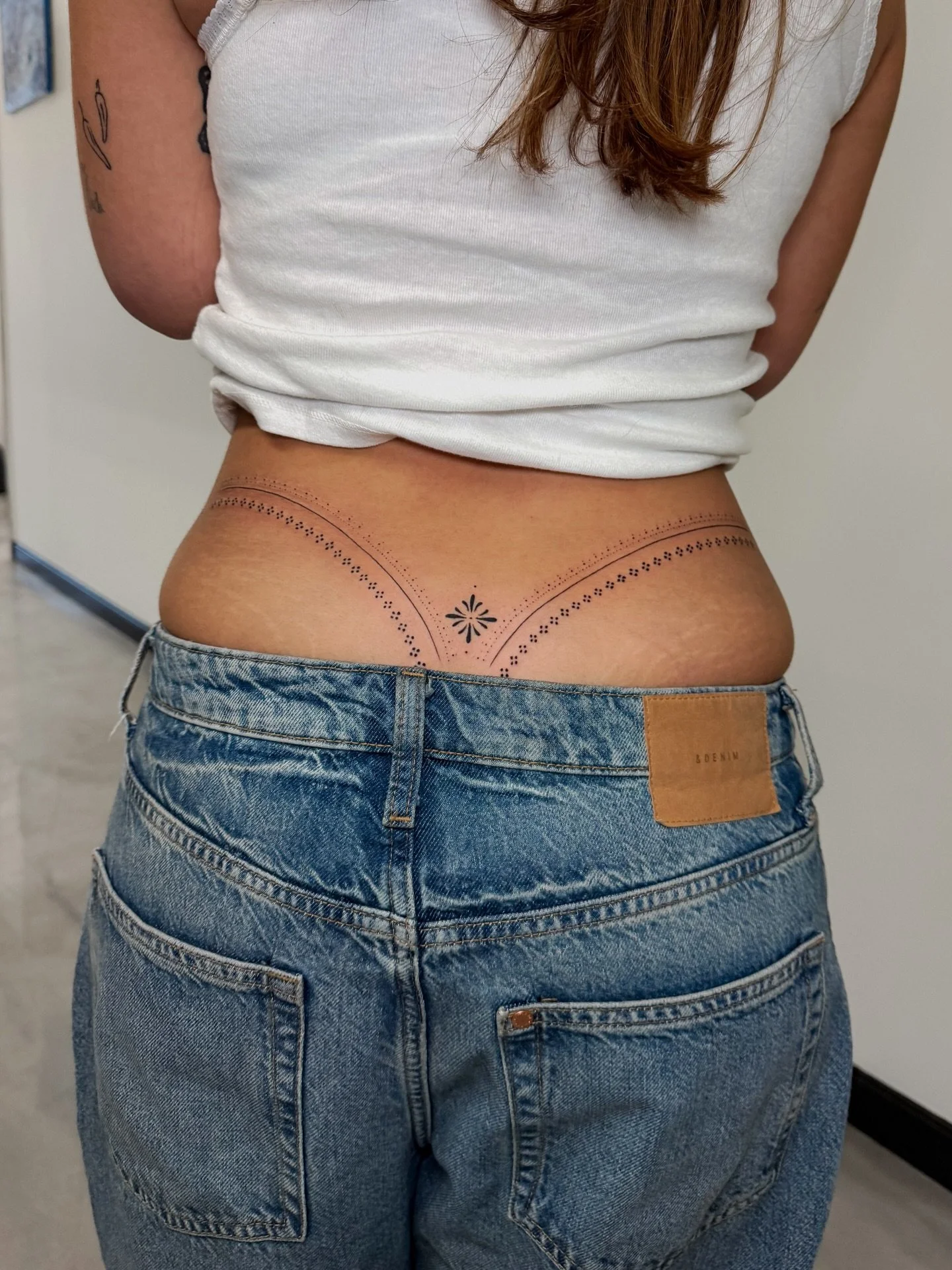 Added more to her ongoing ornamental back piece!