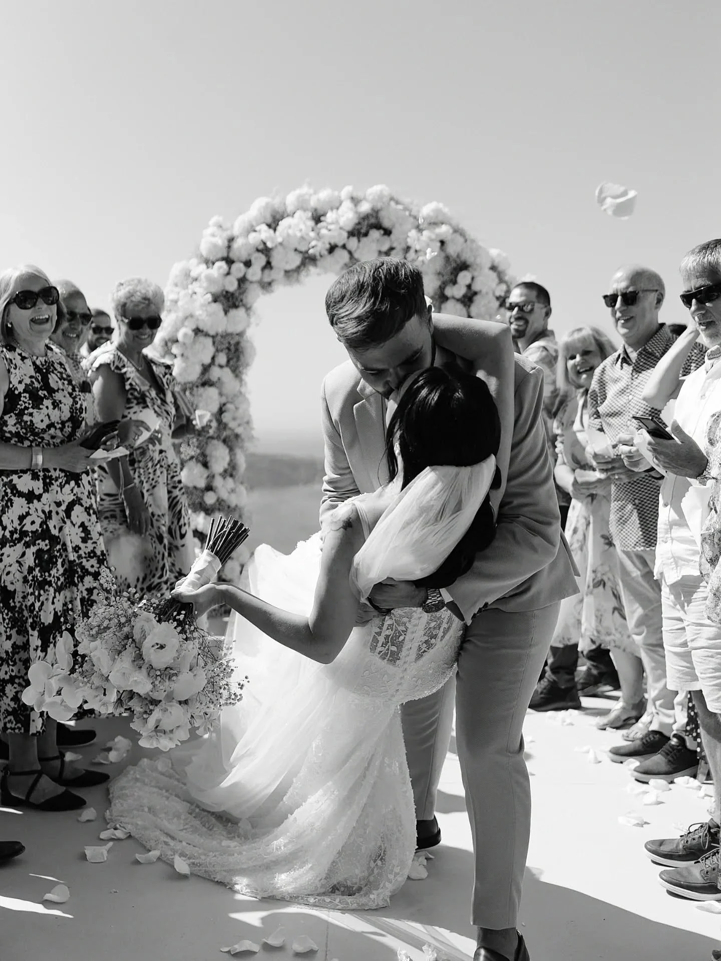 Only dramatic kisses are accepted here as a seal. 💍

Venue: @elvientosantorini
Photographer: @greecephotographer
Videographer: @magic_videography
Flowers: @shadesofflowers.santorini
Bridal Glam: @juliapopovamuah 
DJ - Lighting: @santorinievents
Ente