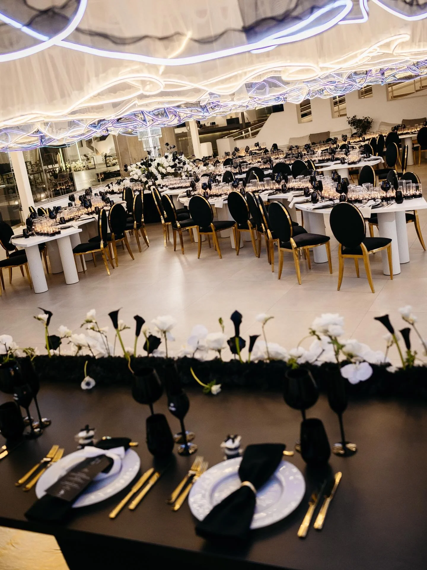 Sometimes I love to challenge traditional wedding aesthetics. That's what I thought while I was planning my own wedding.

What you see, is a thought of a controlled monochromatic palette with details defining balance and with lighting defining zones 