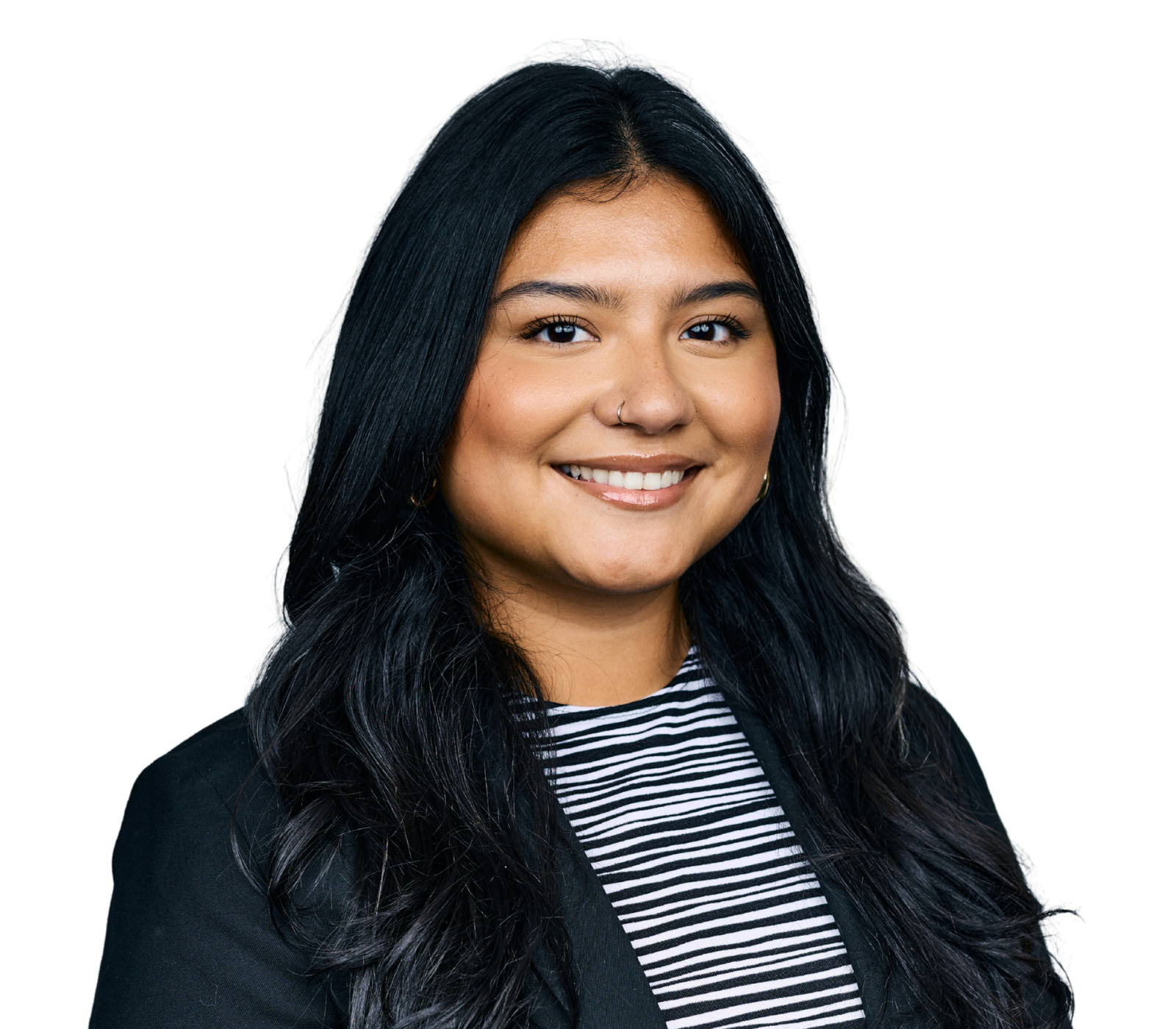 Smiling woman with long dark hair in a white shirt and black blazer on a white background.