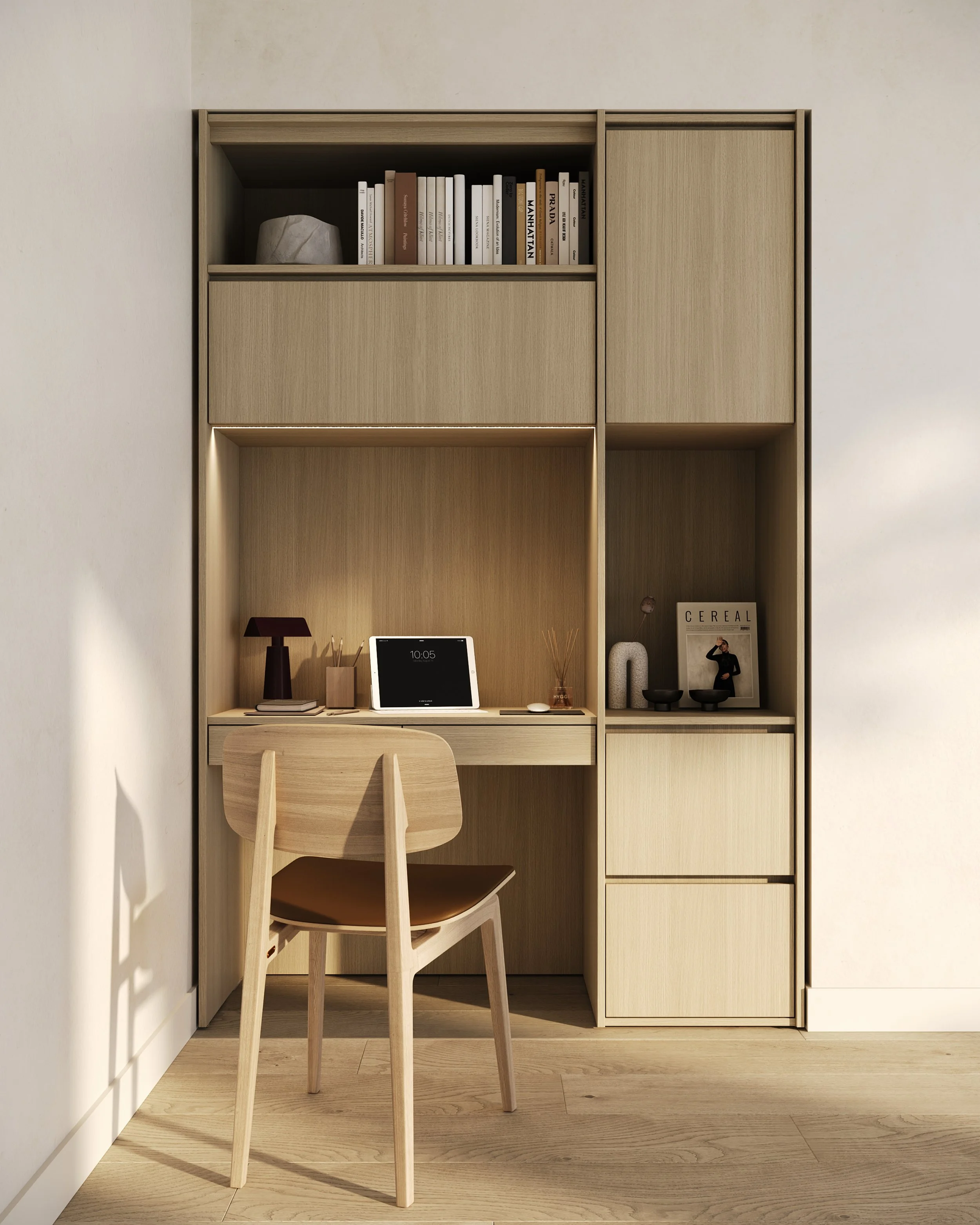 Minimalist home office with wooden desk, chair, and built-in wooden shelves containing books and decorative items.