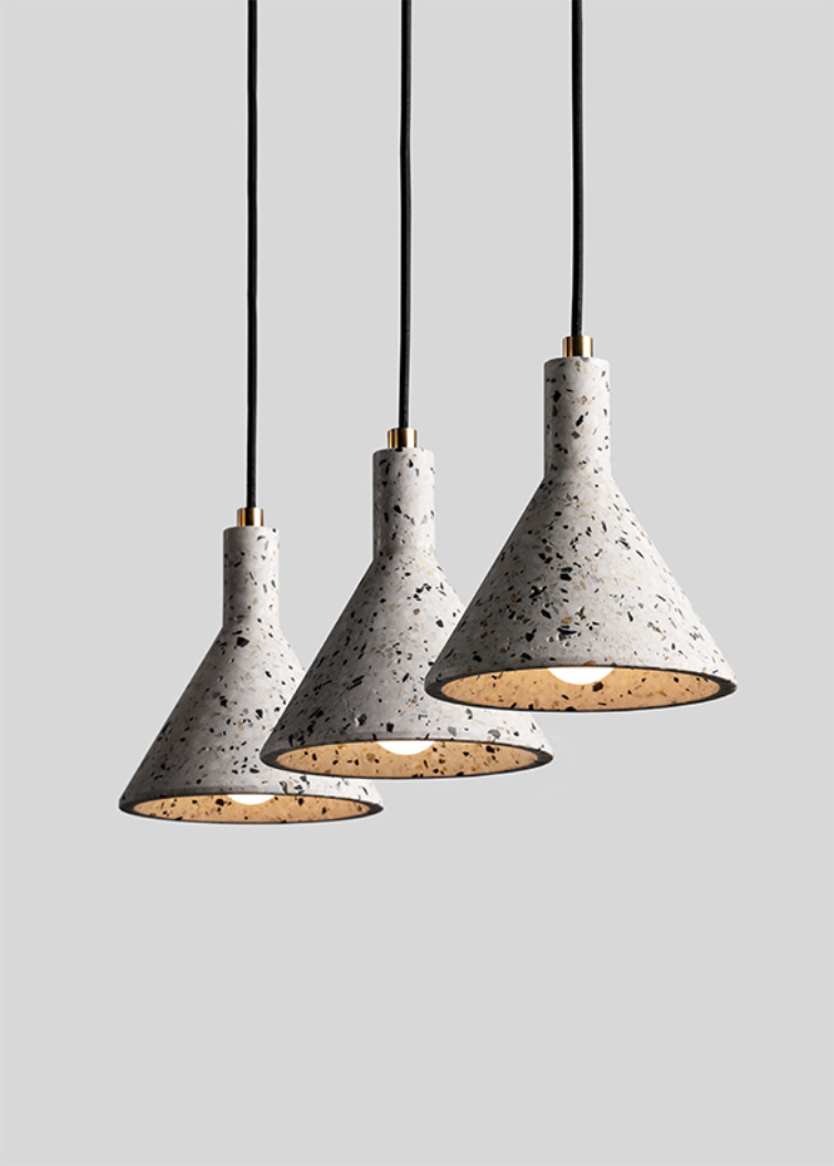 Three White Terrazzo Stone Pendants Light On Light Grey Background