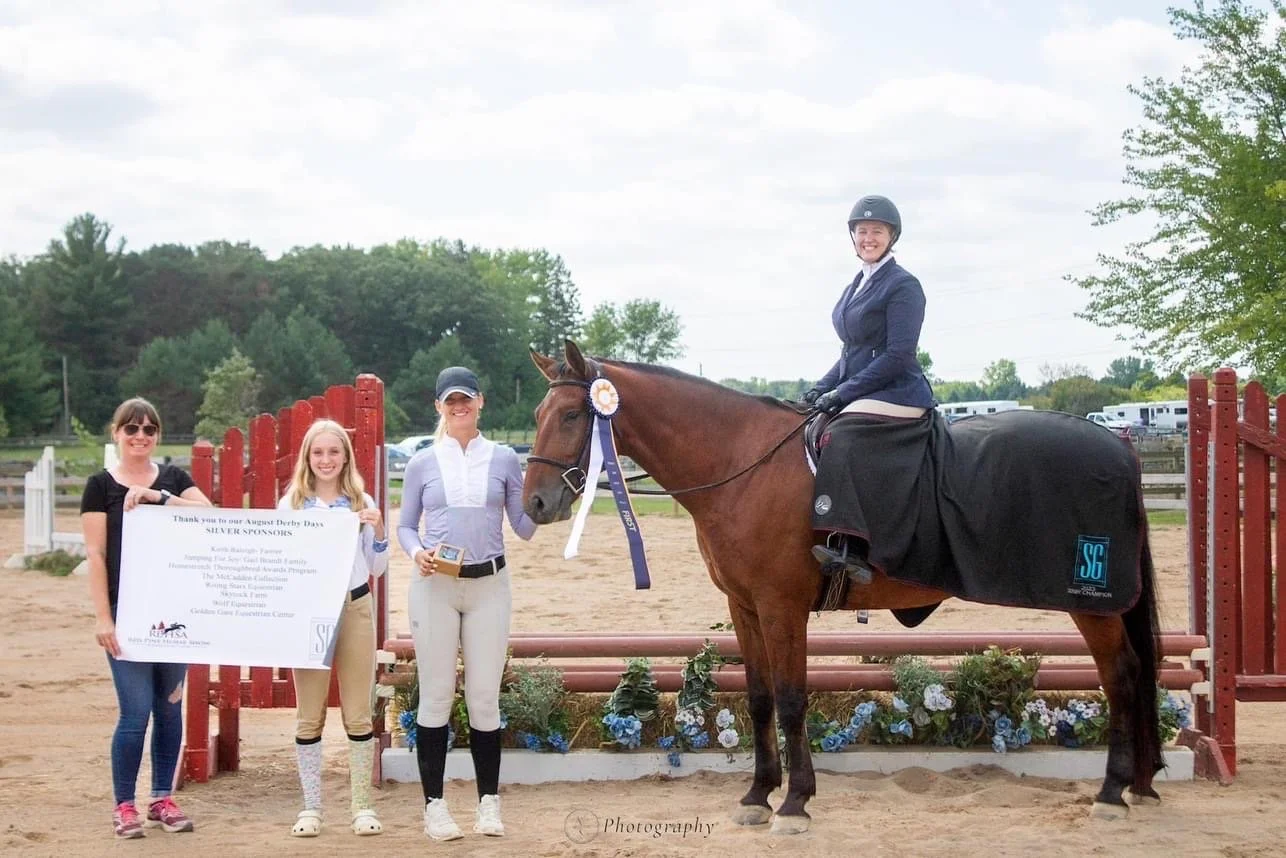 Corie Markgraf and Silis Hunter Champion
