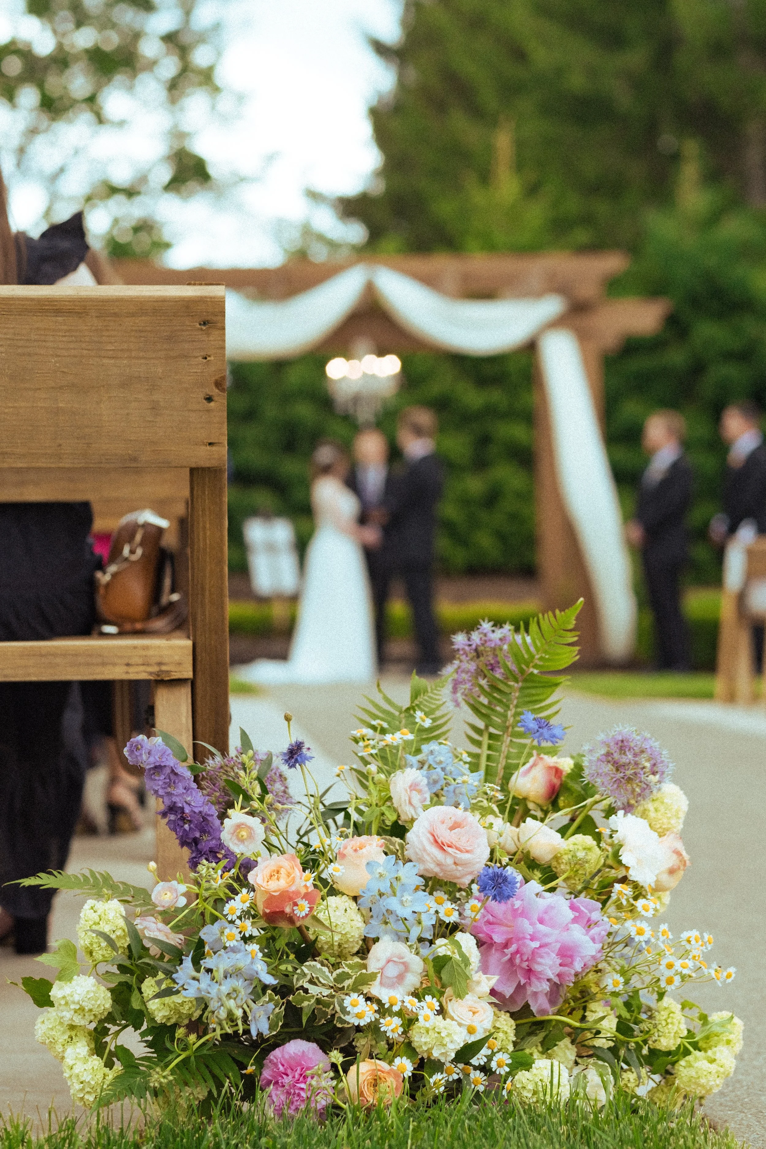 Spring floral meadow. Pink peonies. Spring wildflowers