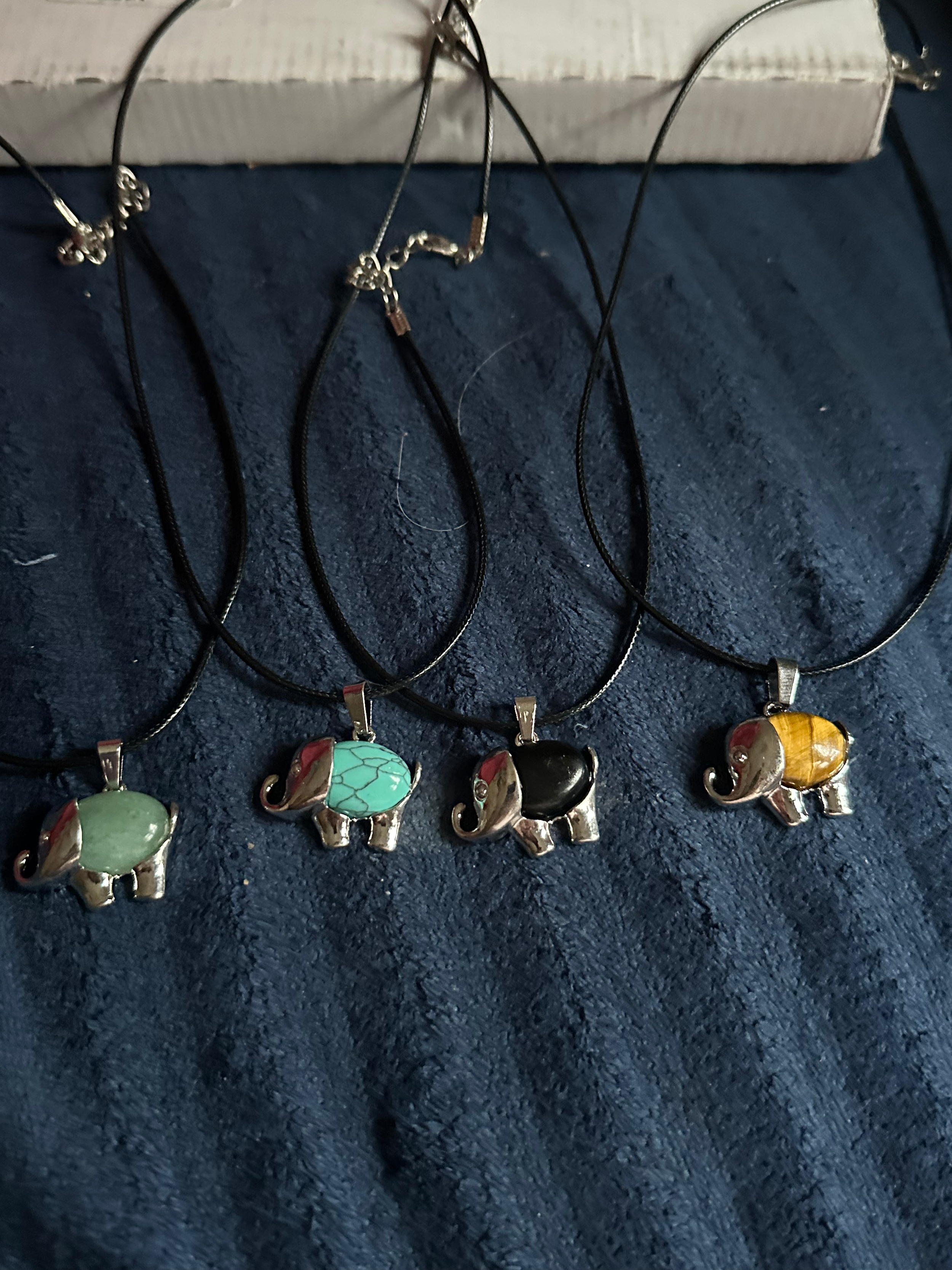 Elephant crystal necklaces.png